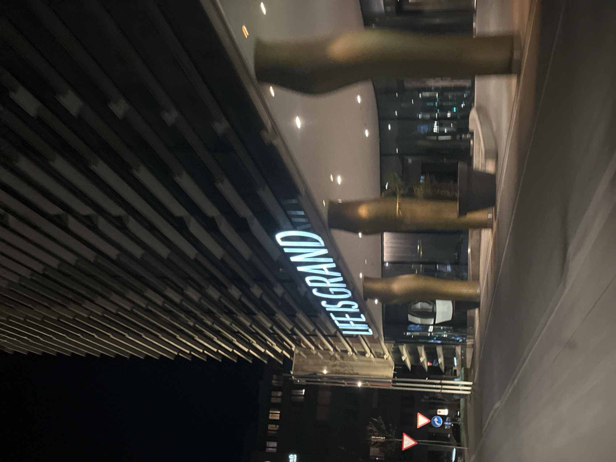 Illuminated "Life is Grand" sign observed in Glattbrugg, Switzerland