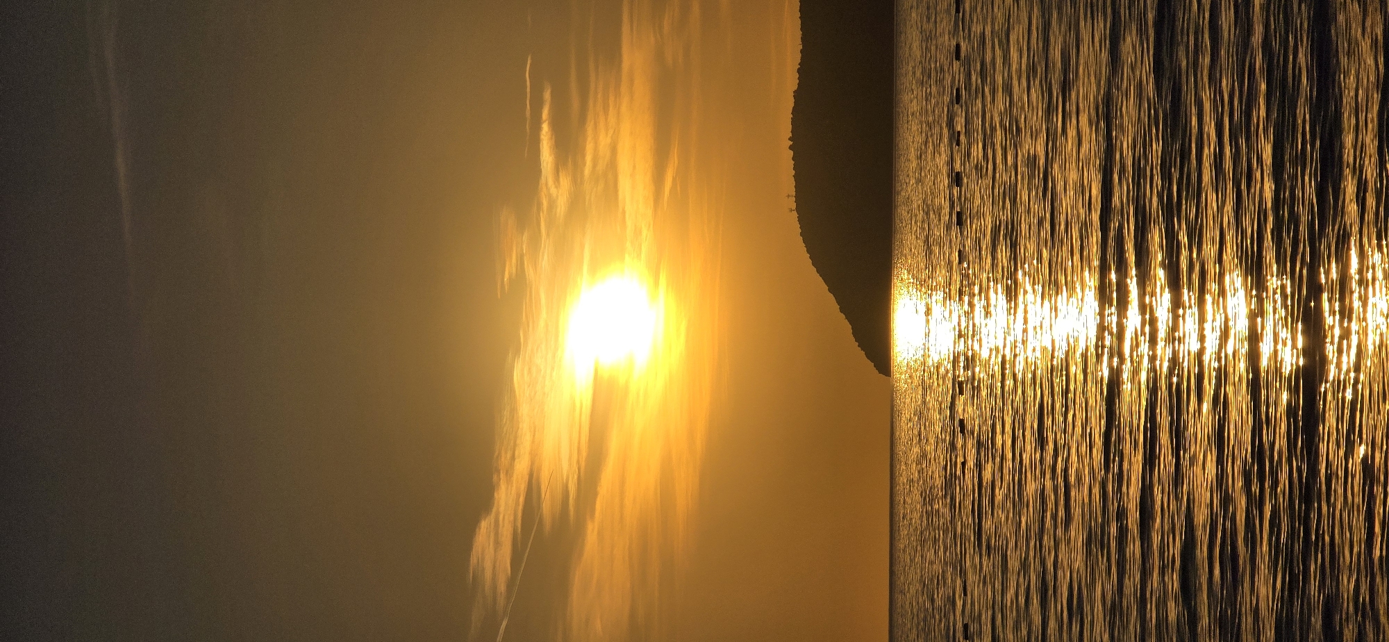 Sunset creates shimmering reflections over Adriatic Sea in Bar