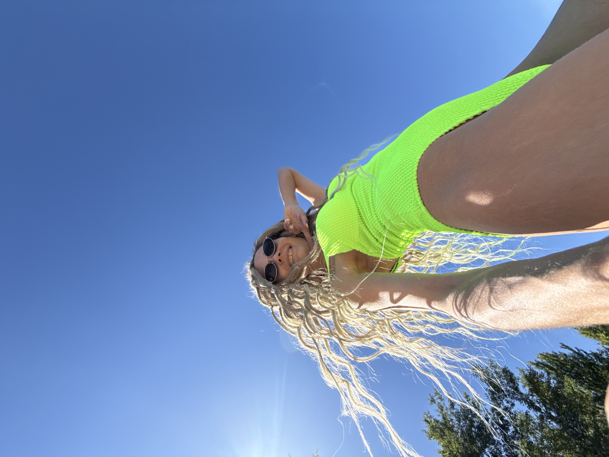 Woman photographed against blue sky in Шебунино, Russia