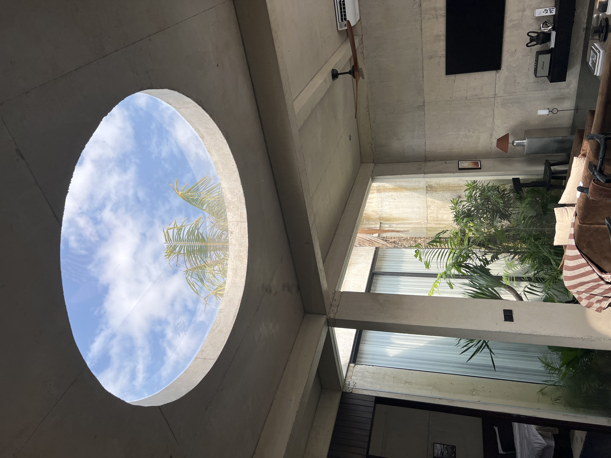 Modern concrete home interior documented in Mengwi, Indonesia