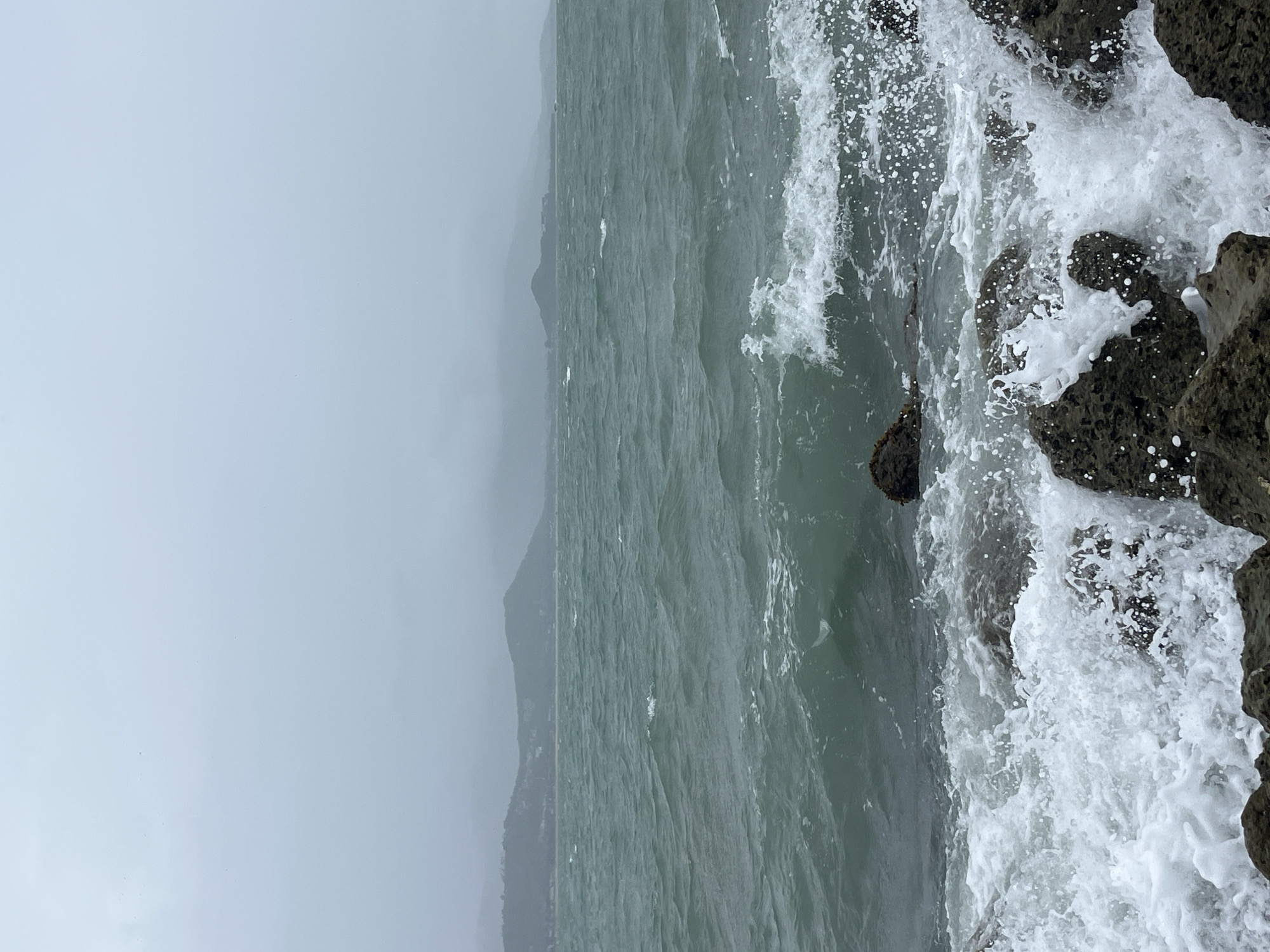 Rough coastal waters breaking over rocks at Ko Samui