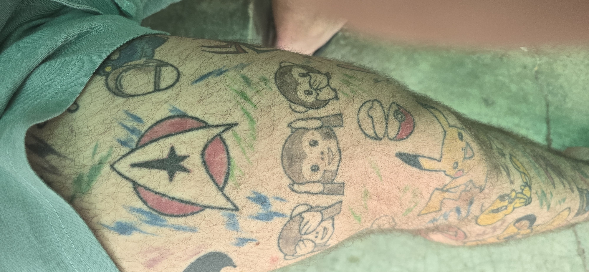 Person documents cartoon tattoo collection in Bulgarian village