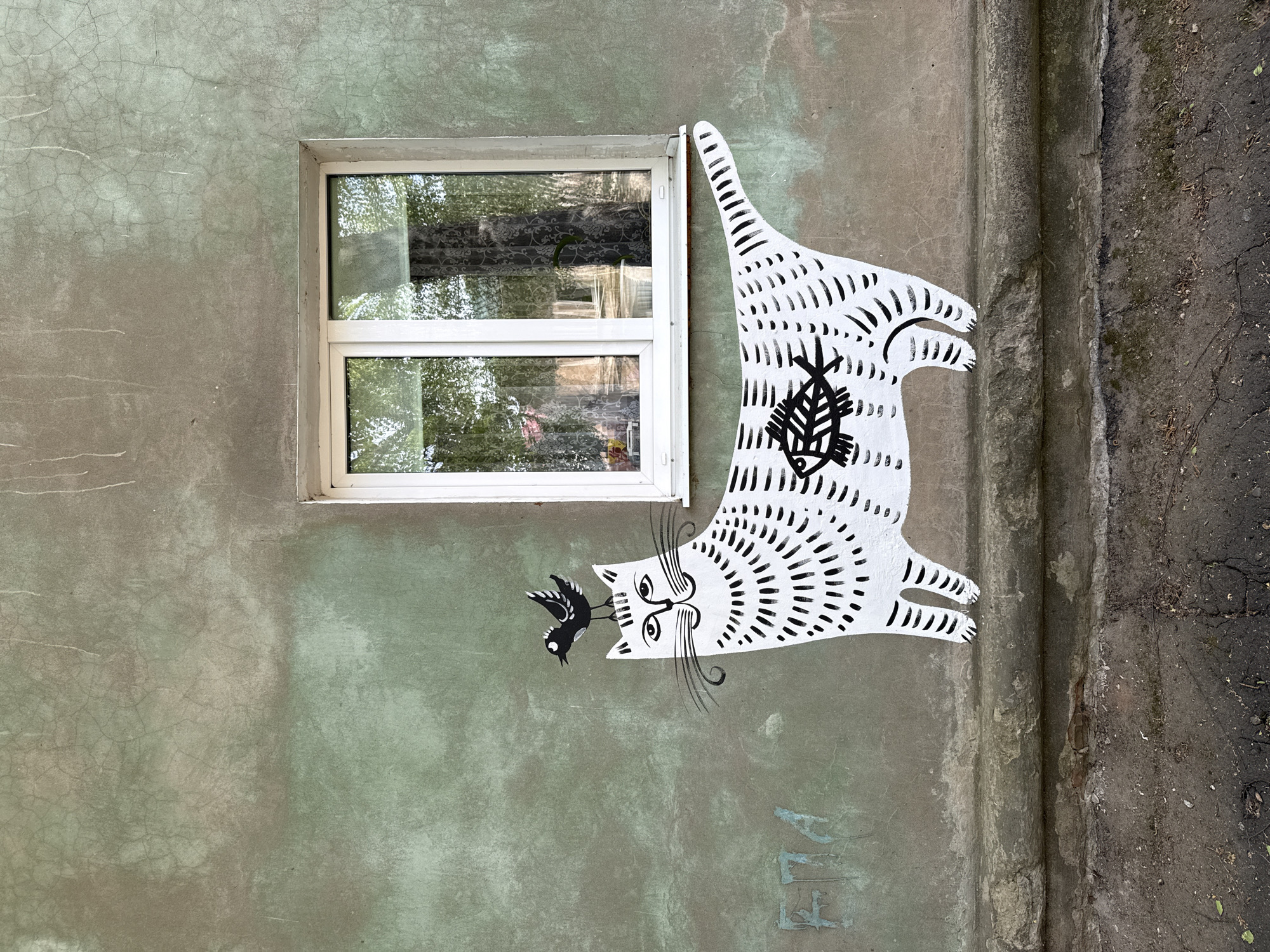 Cat murals brighten building walls across Votkinsk, Russia
