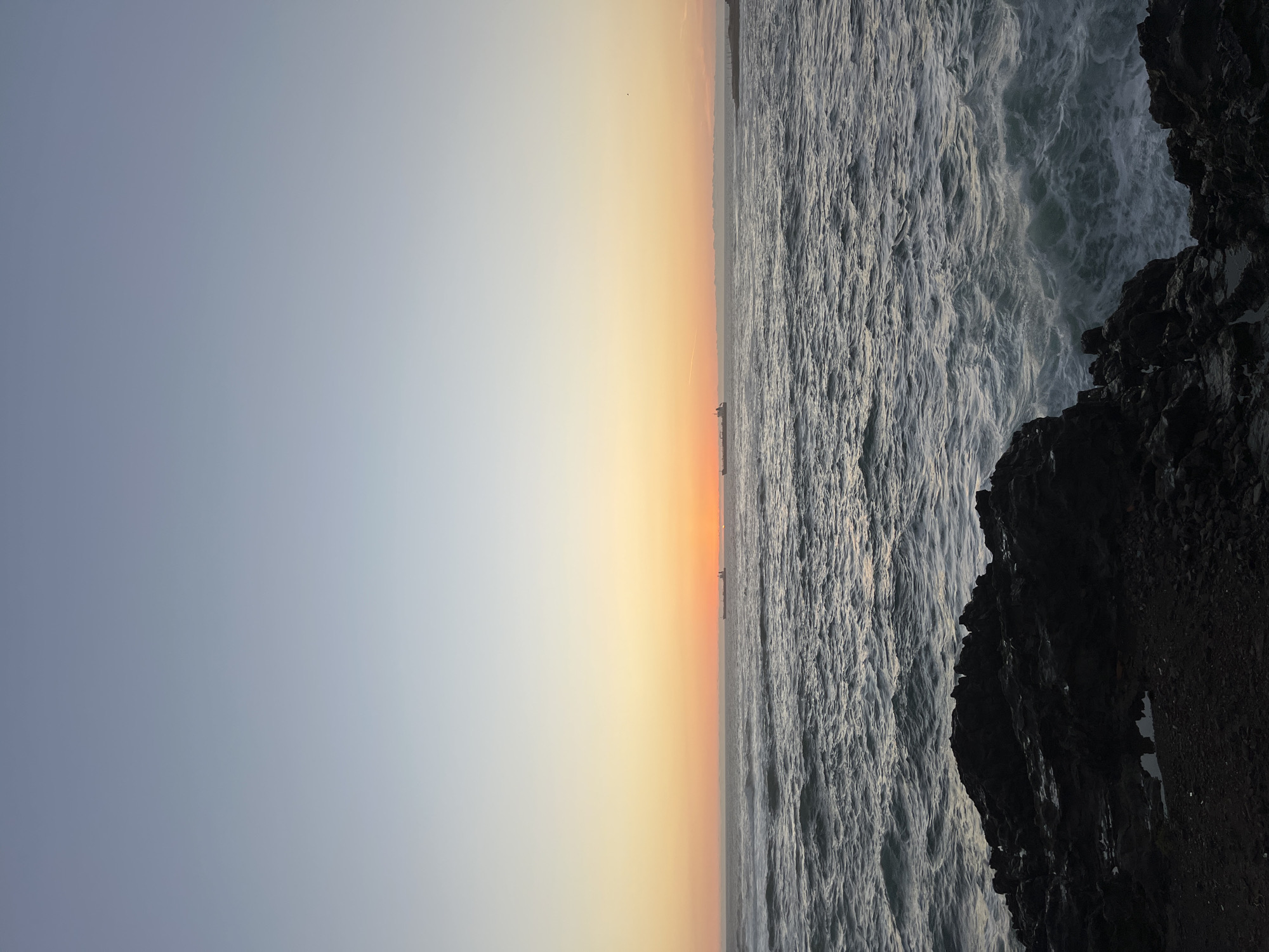 Sunset observed over ocean coastline in Arica, Chile