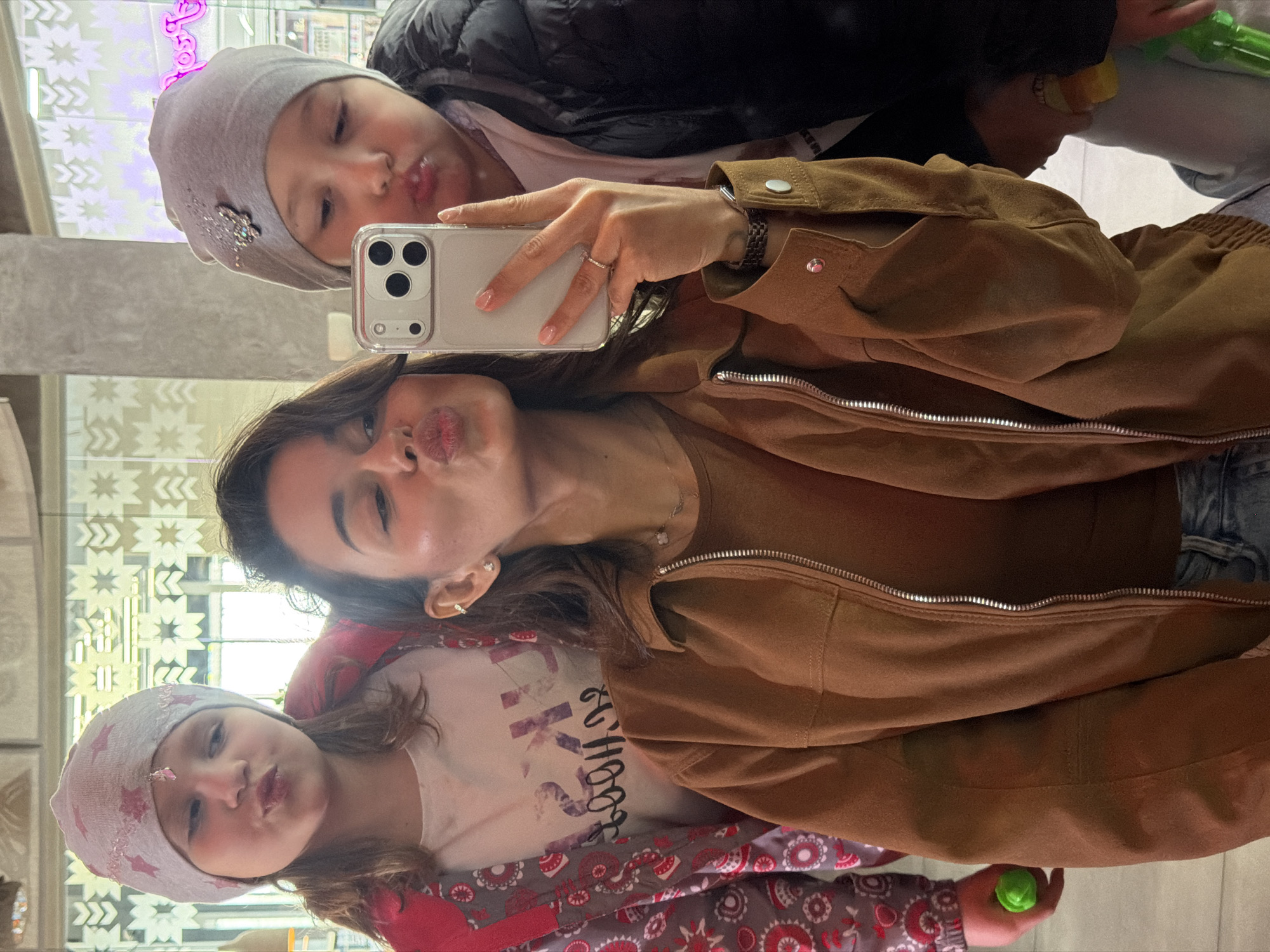 Family selfie captured at indoor venue in Krasnoyarsk