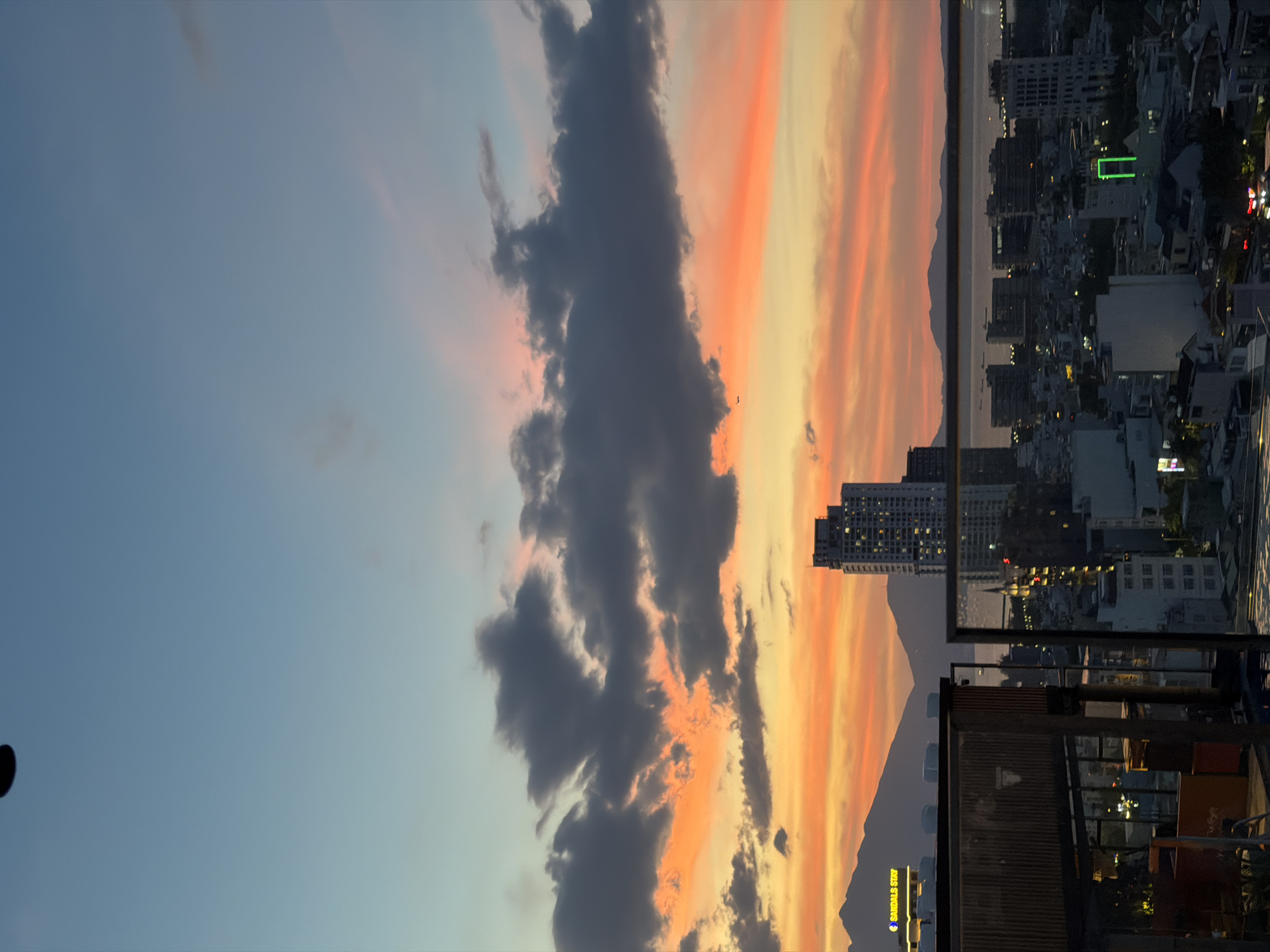 Rooftop sunset views across Đà Nẵng's skyline and venues