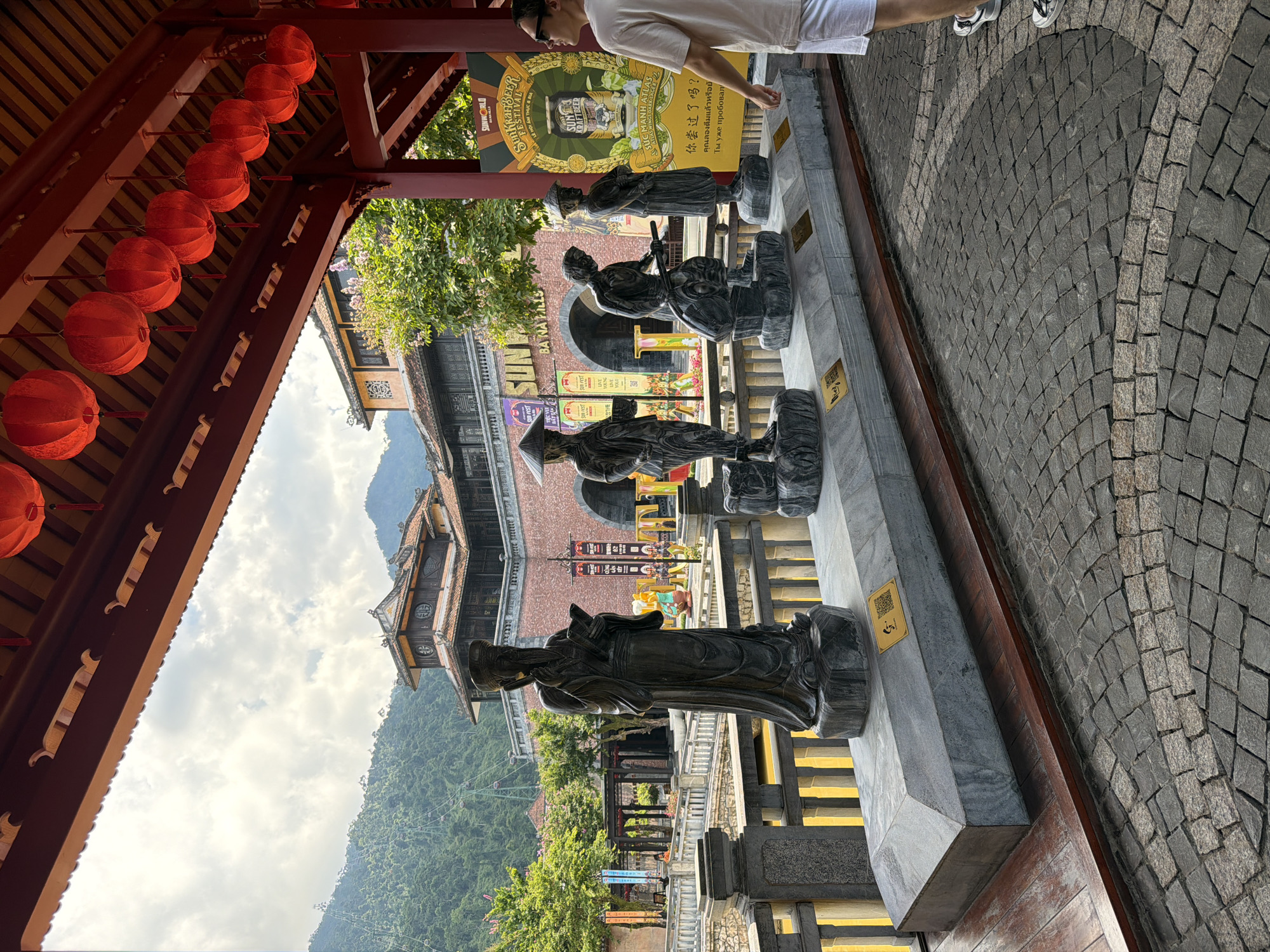 Tourist documents traditional architecture at Đà Nẵng attraction