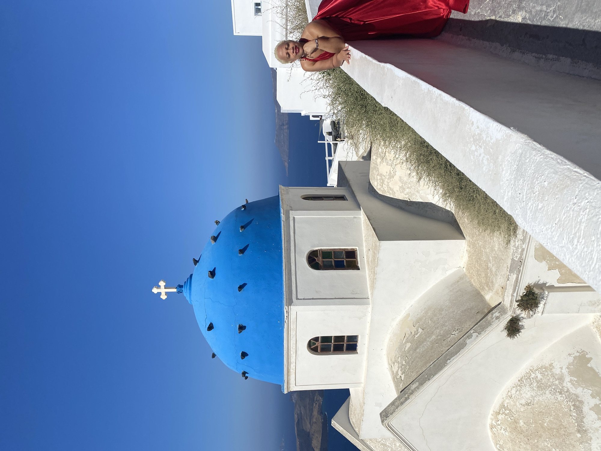 Morning at a blue-domed church in Santorini