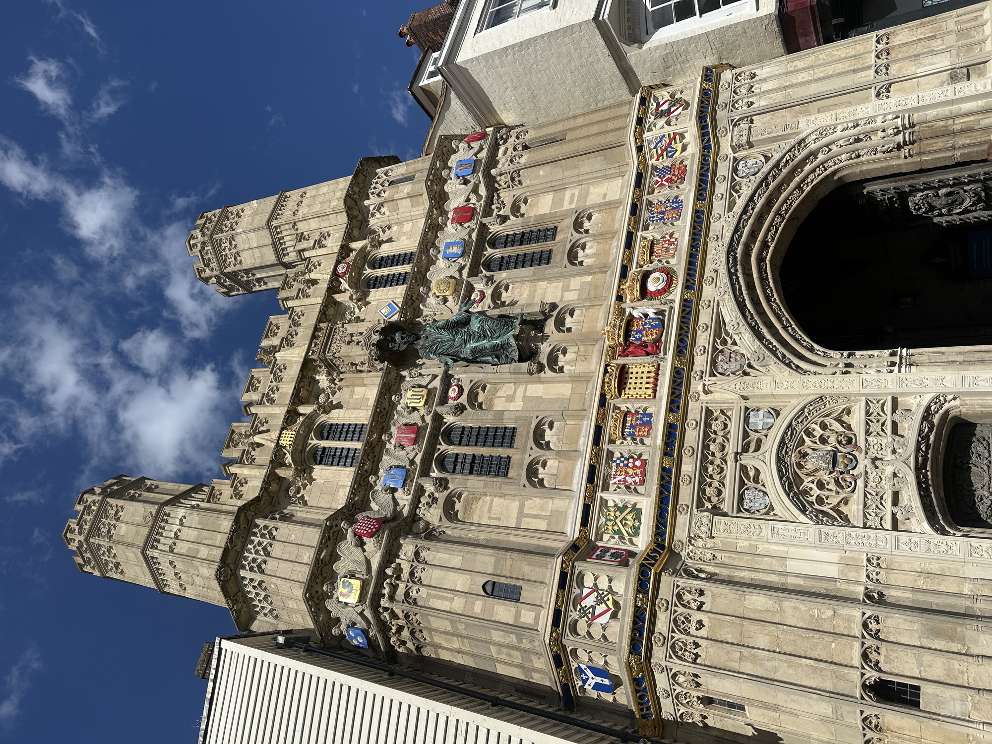 Canterbury visitor documents cathedral gate and colorful street scenes