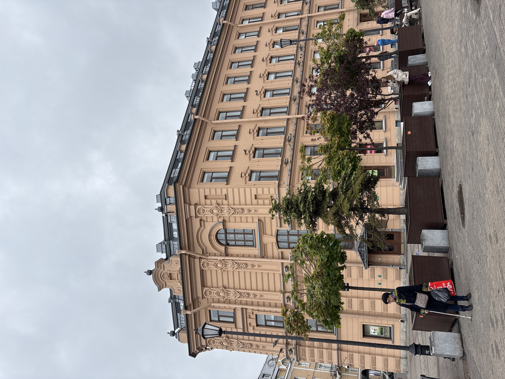 Overcast morning street scenes documented on Saint Petersburg's Nevsky Prospekt