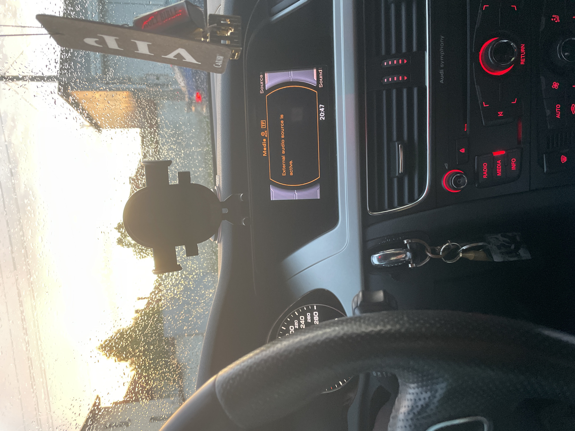 Driver documents rainy evening commute in Audi, Ihtiman Bulgaria
