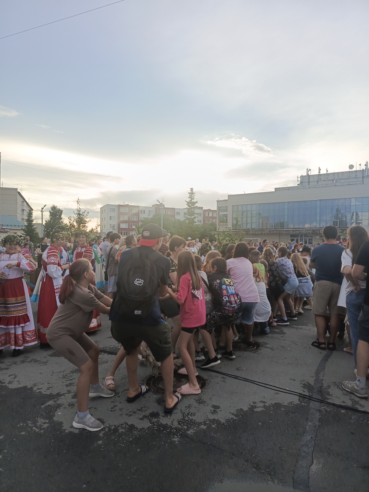 Community gathering and tug-of-war in Krivodanovka, Russia