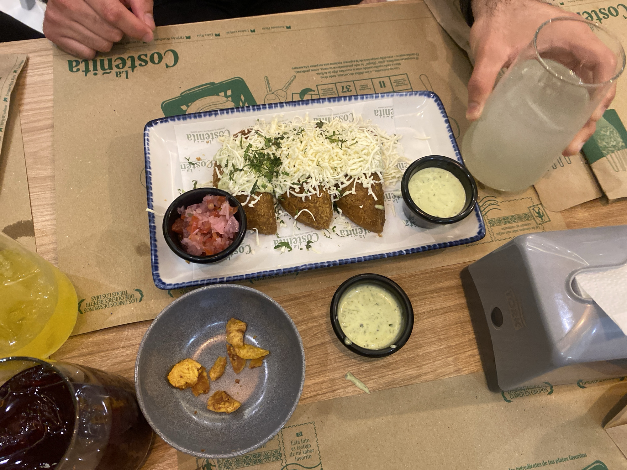 Diners share meal at La Costeñita restaurant in Ecuador