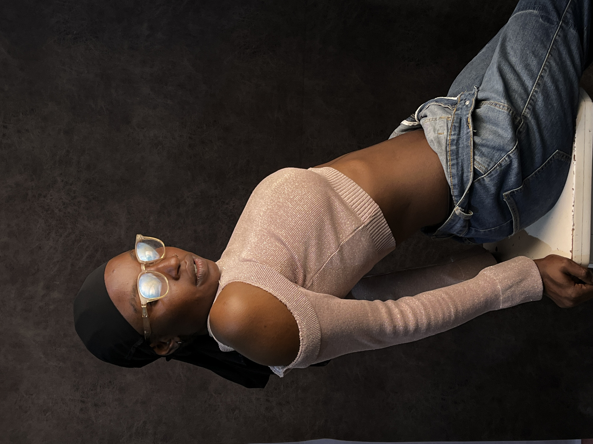 Person rests in reclined position in Barakin Akawo, Nigeria