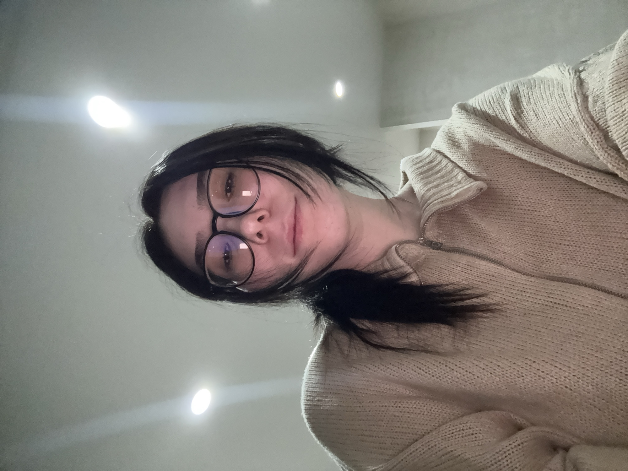 Woman takes selfies with cat in Izhevsk apartment