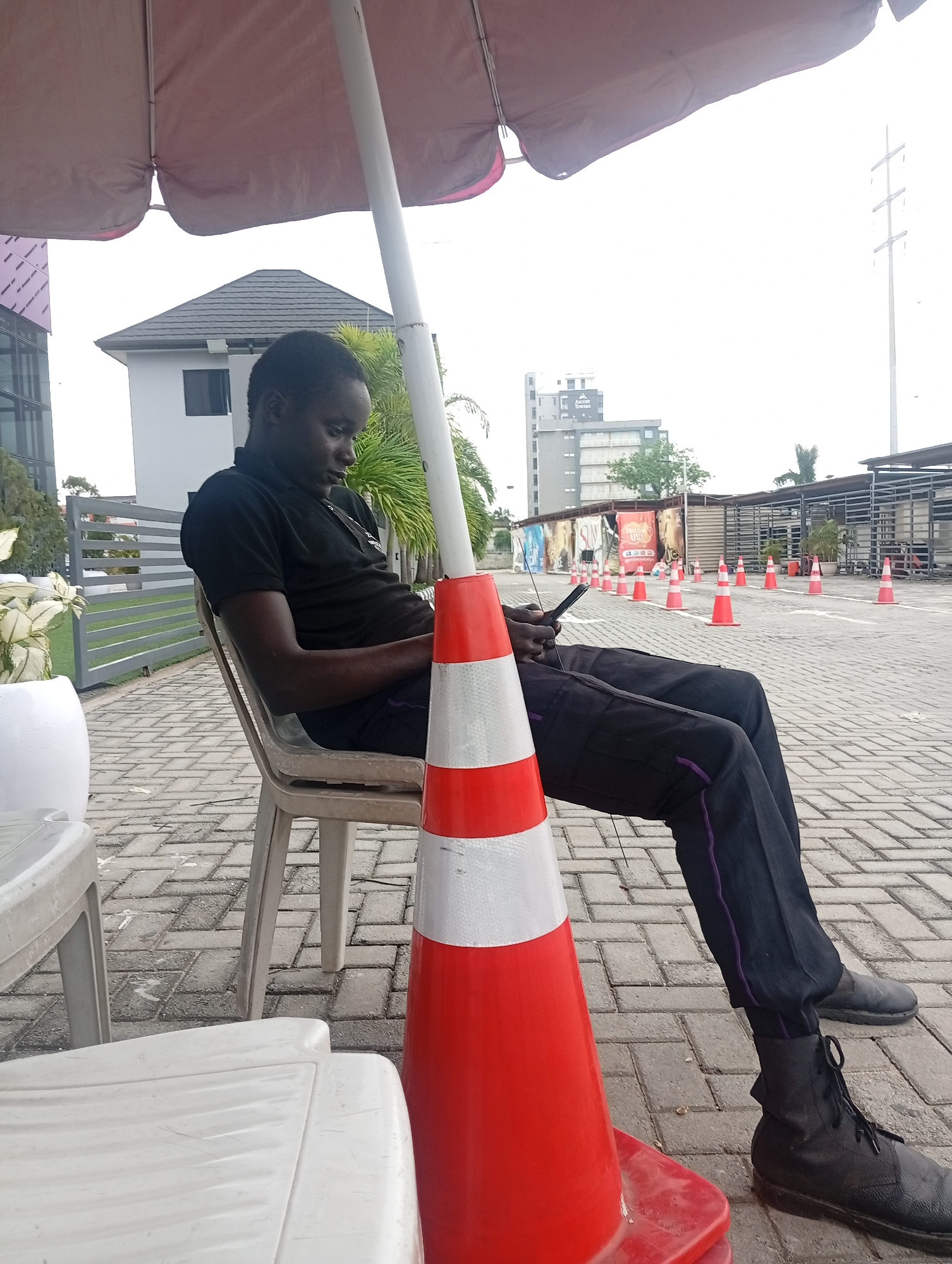 Gate checkpoint activity near Ascort Tower, Ilado, Nigeria