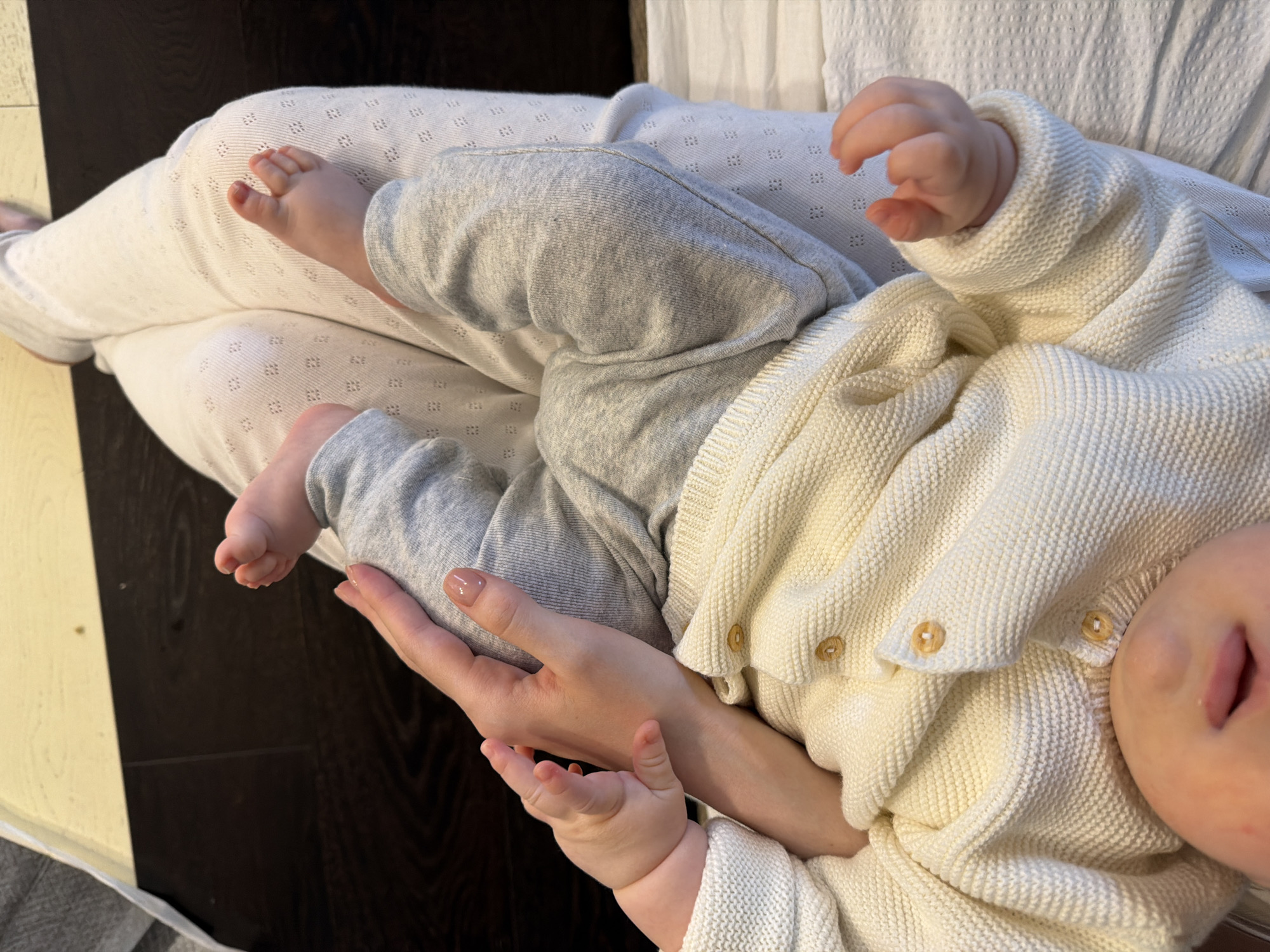 Parent and baby share tender moments in Khimki home
