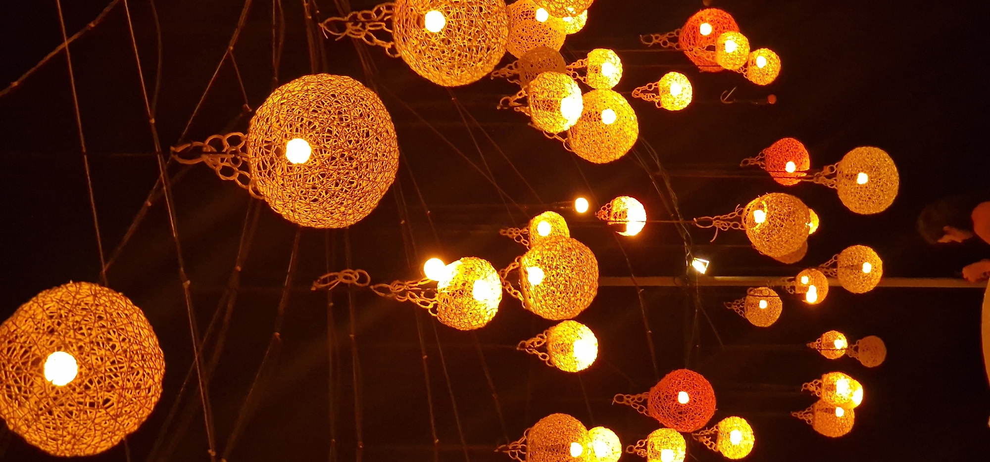 Evening dining scene captured at illuminated Mirissa restaurant