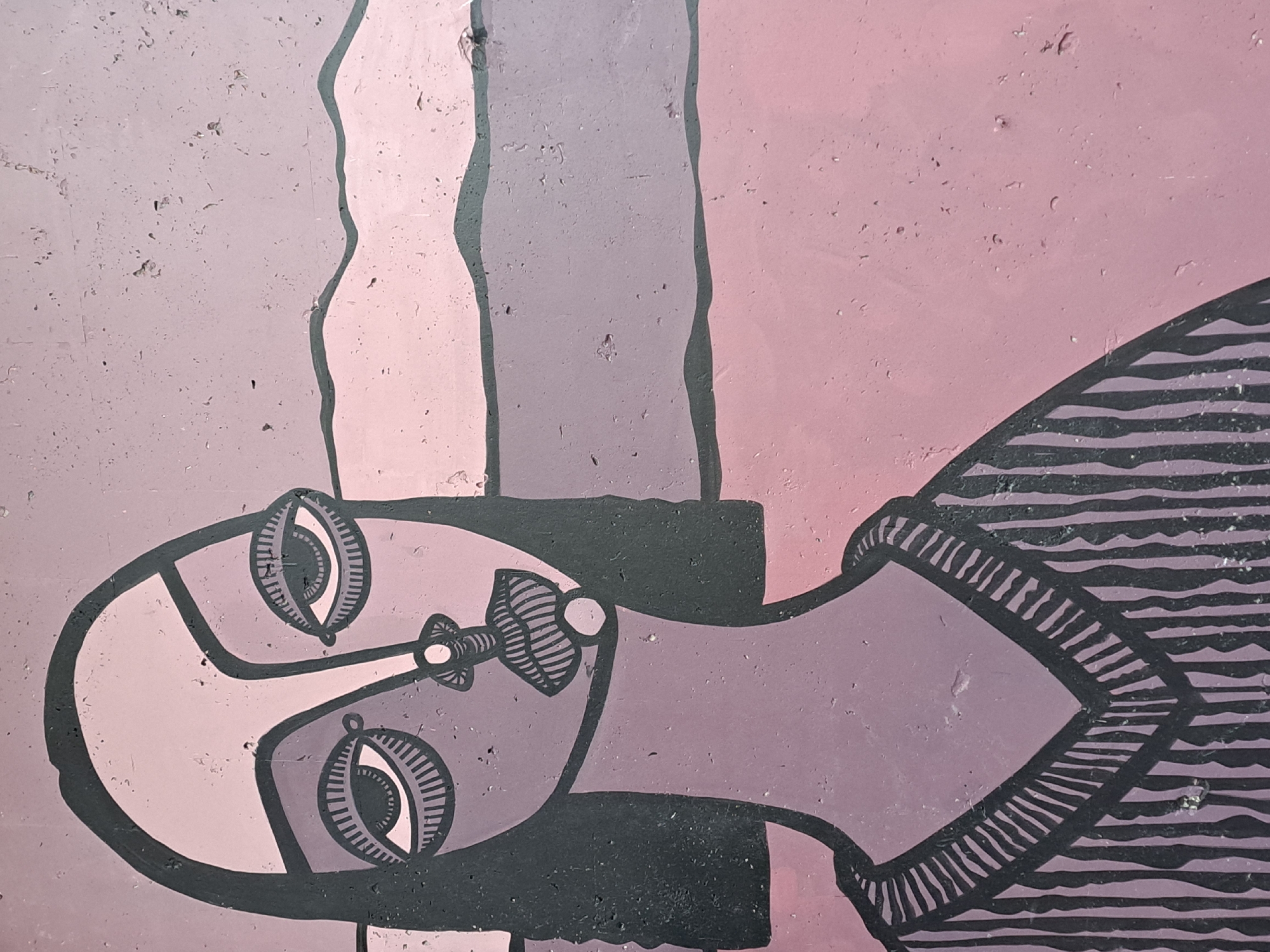 Public art documented in Yerevan: cubist mural, flower-adorned statue