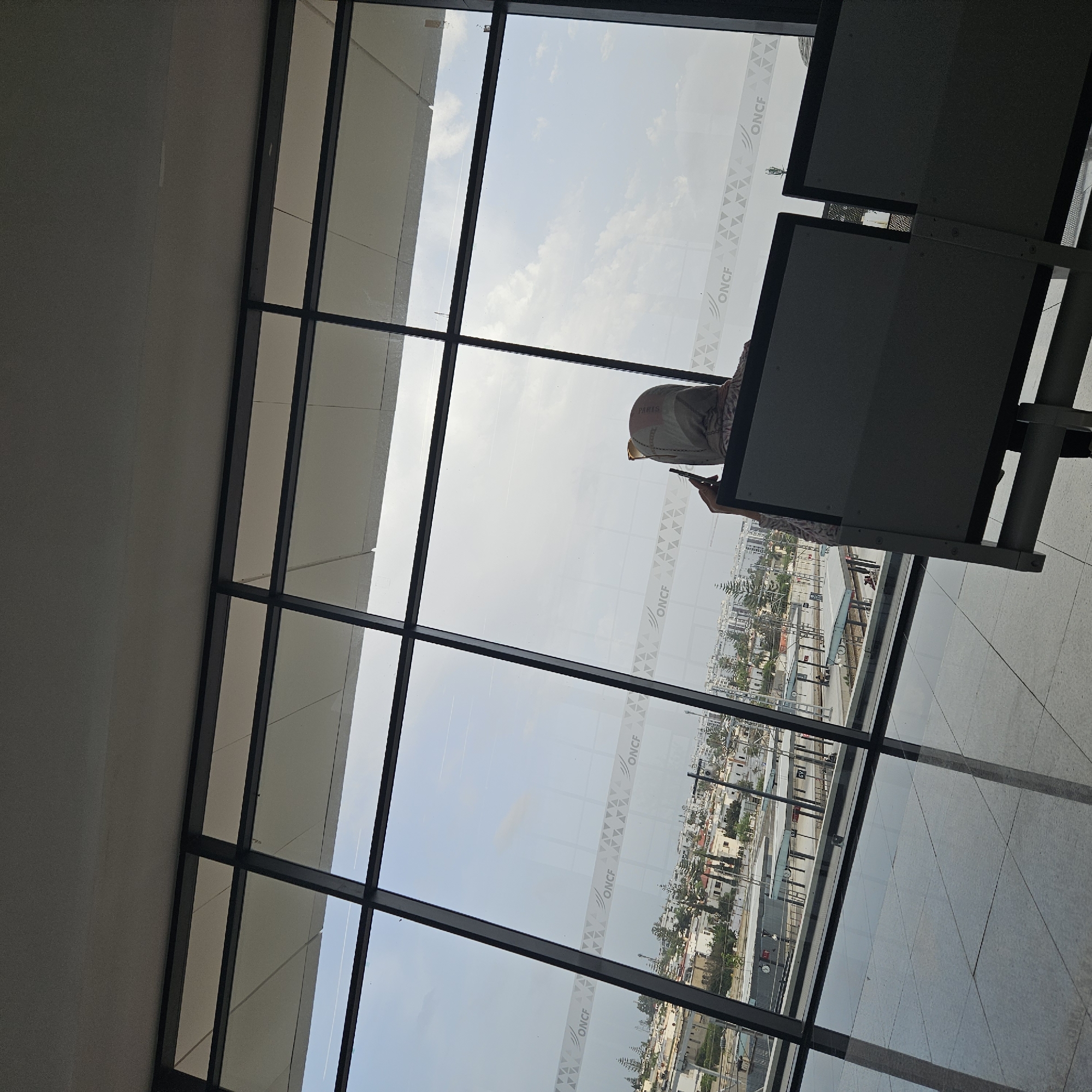 Witness documents afternoon scenes across Rabat transit hub, cityscape