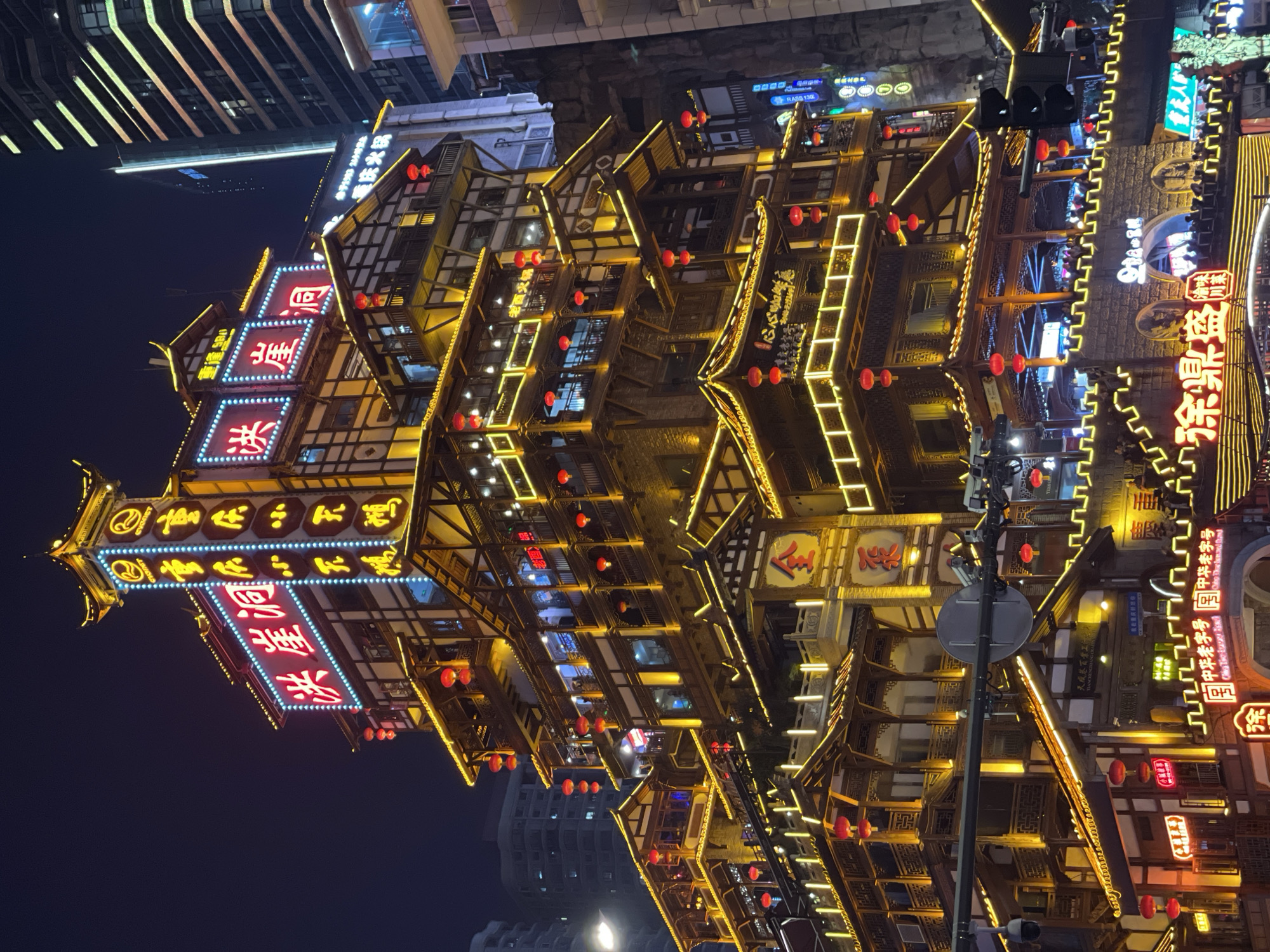 Crowds gather at Chongqing's illuminated Hongyadong tourist complex