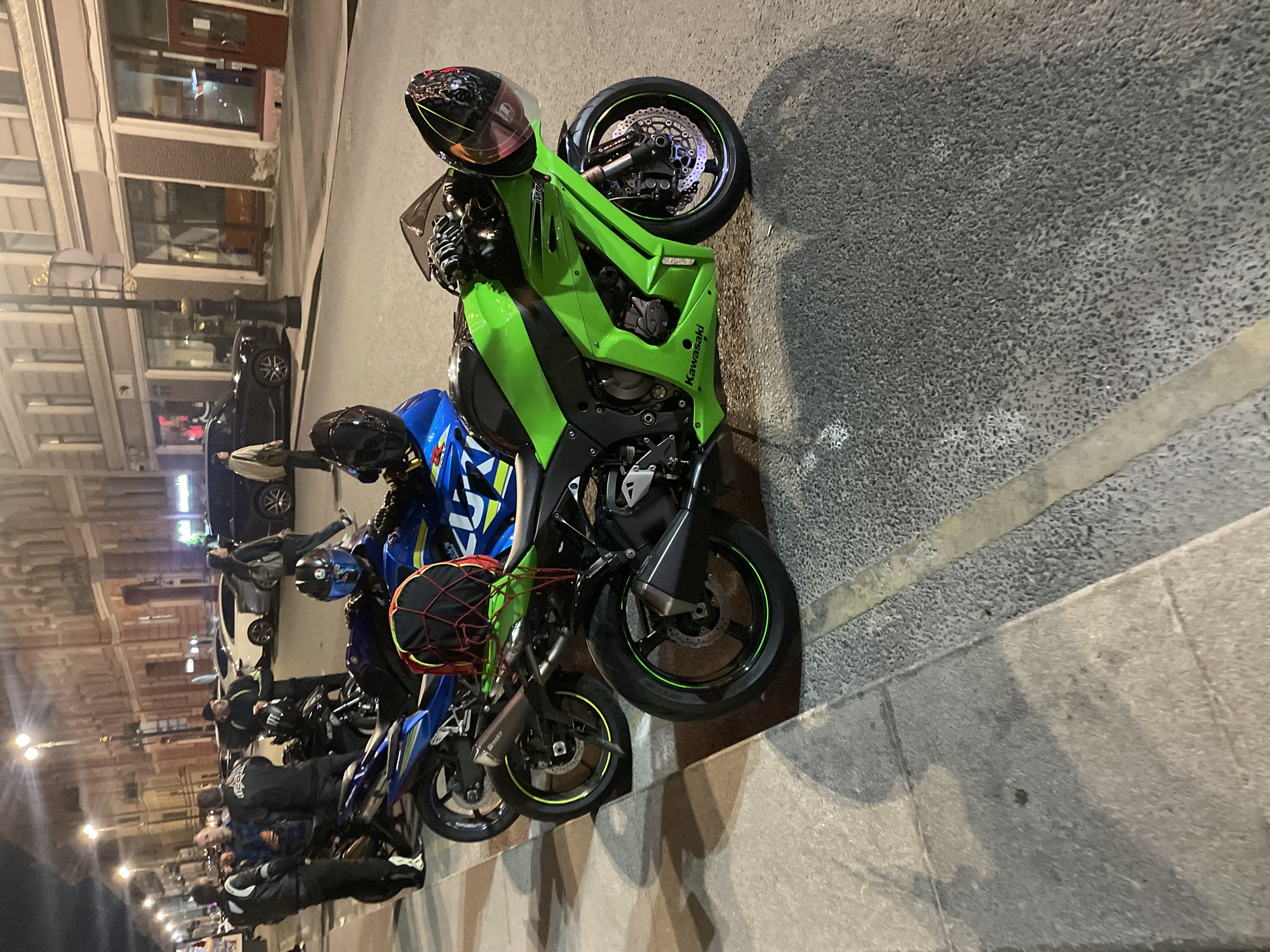 Motorcycles gather on Saint Petersburg street at night