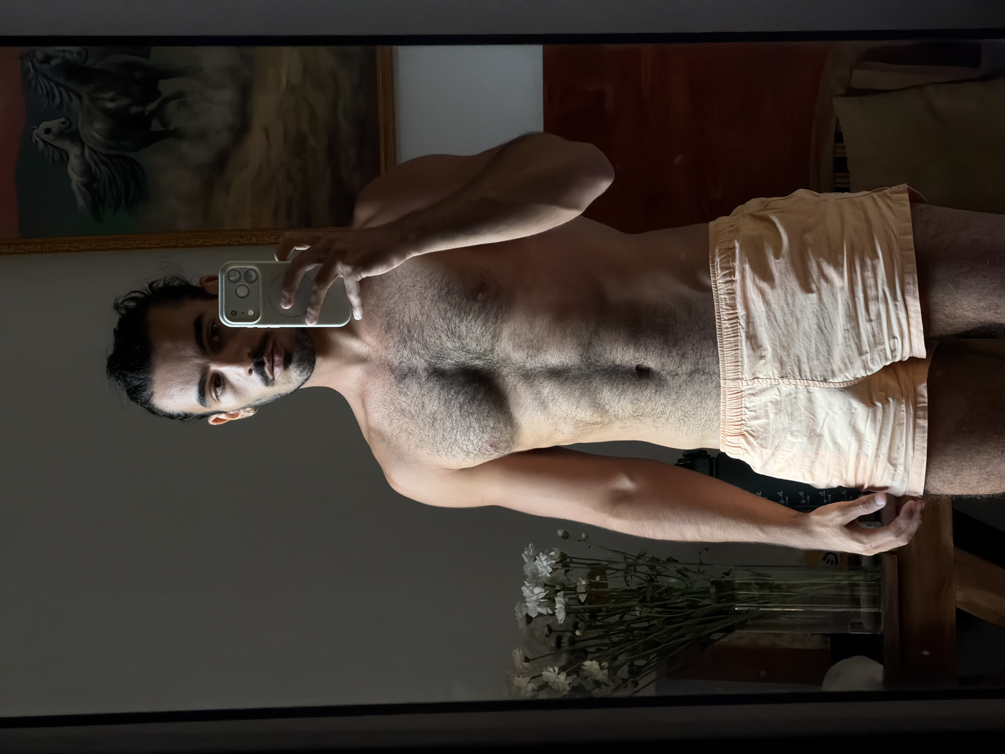 Man takes mirror selfie indoors in North Kuta
