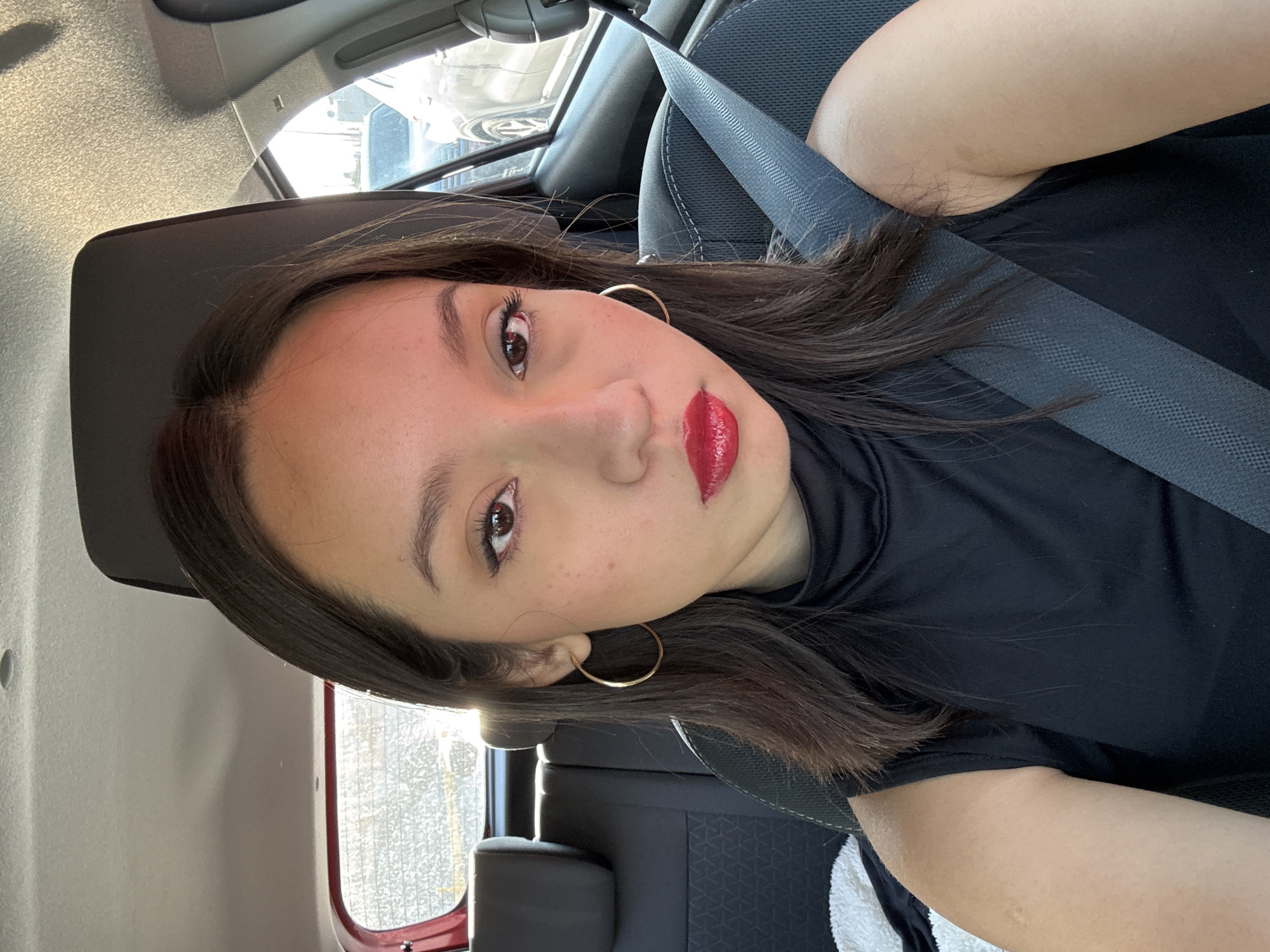 Woman takes car selfie in Puebla, Mexico