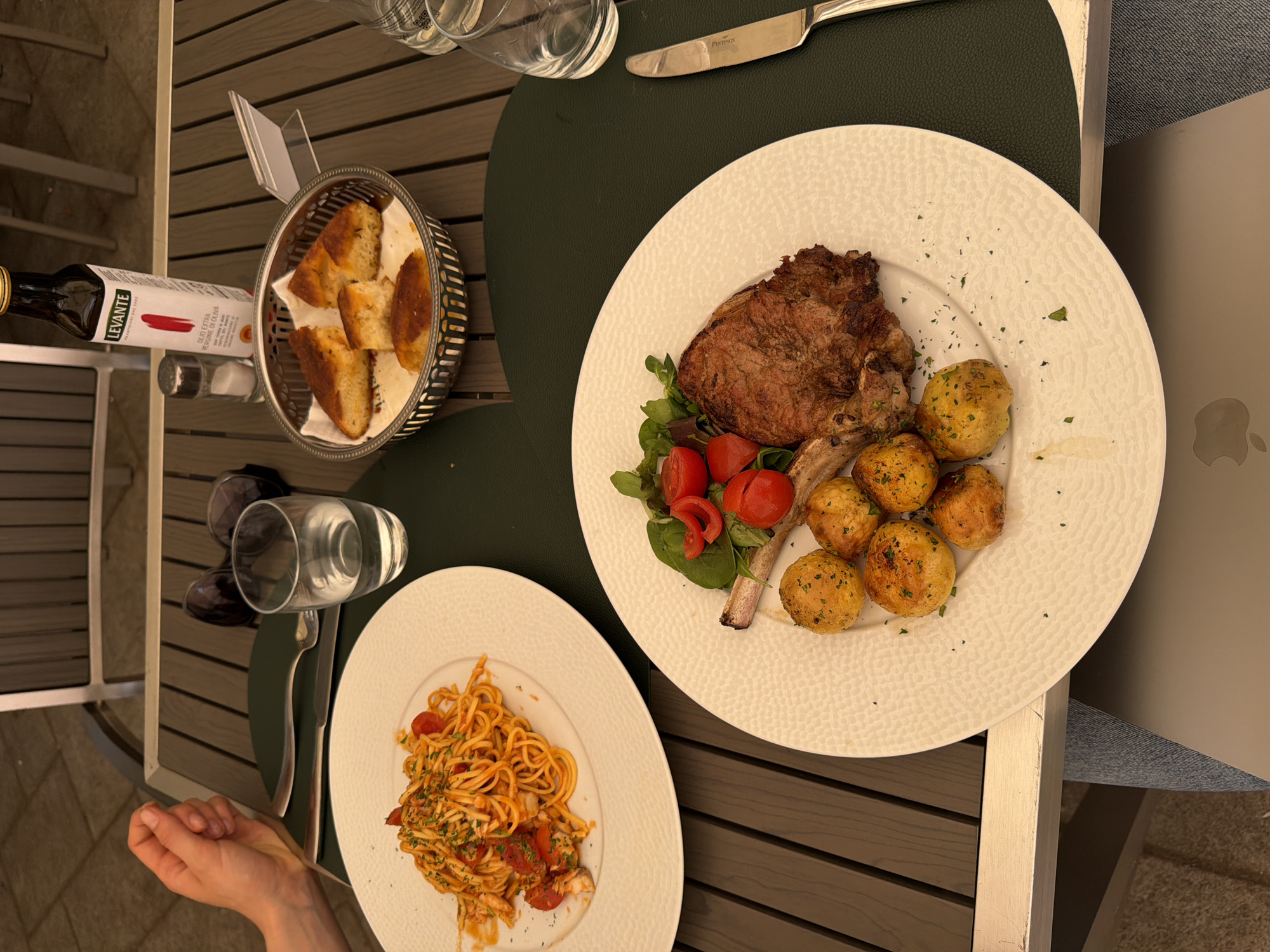 Lunch and a local monument in Milan's midday streets