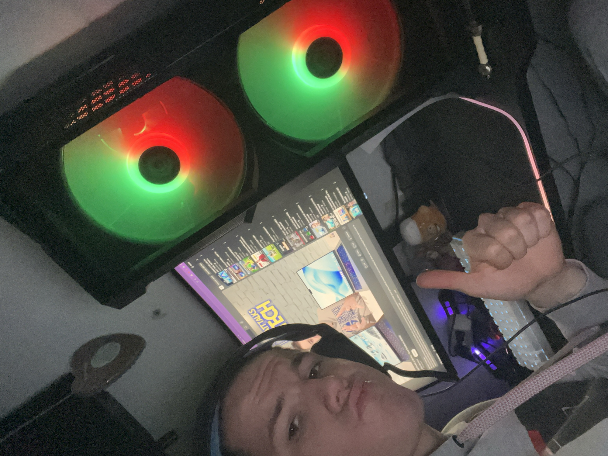 Person takes selfie at computer workstation in Germany