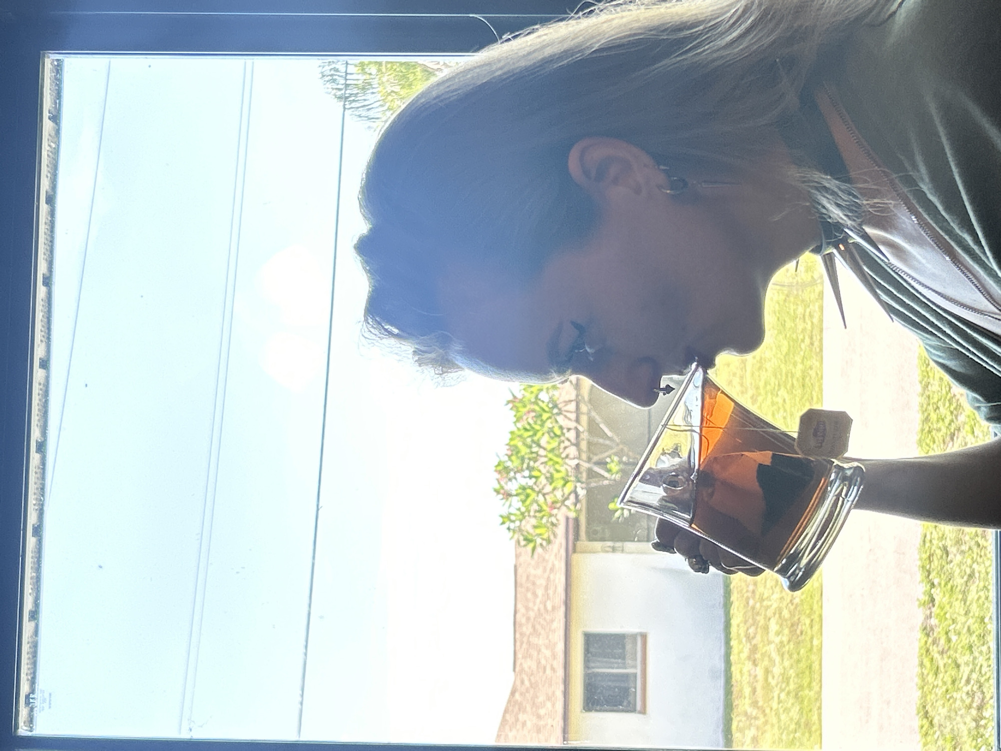 Woman enjoys afternoon tea in Cape Coral home