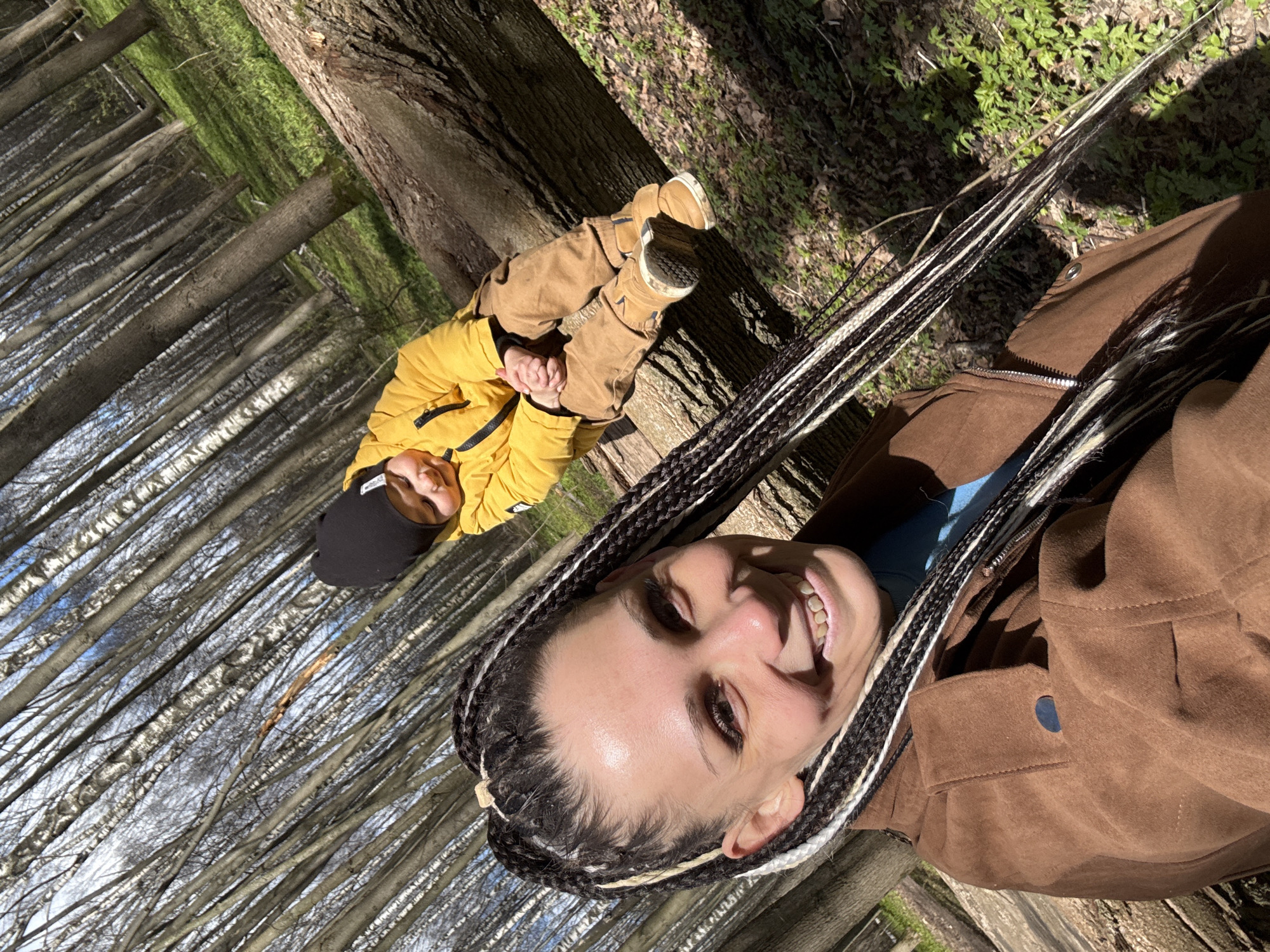 Woman and child spotted in forest wearing autumn attire