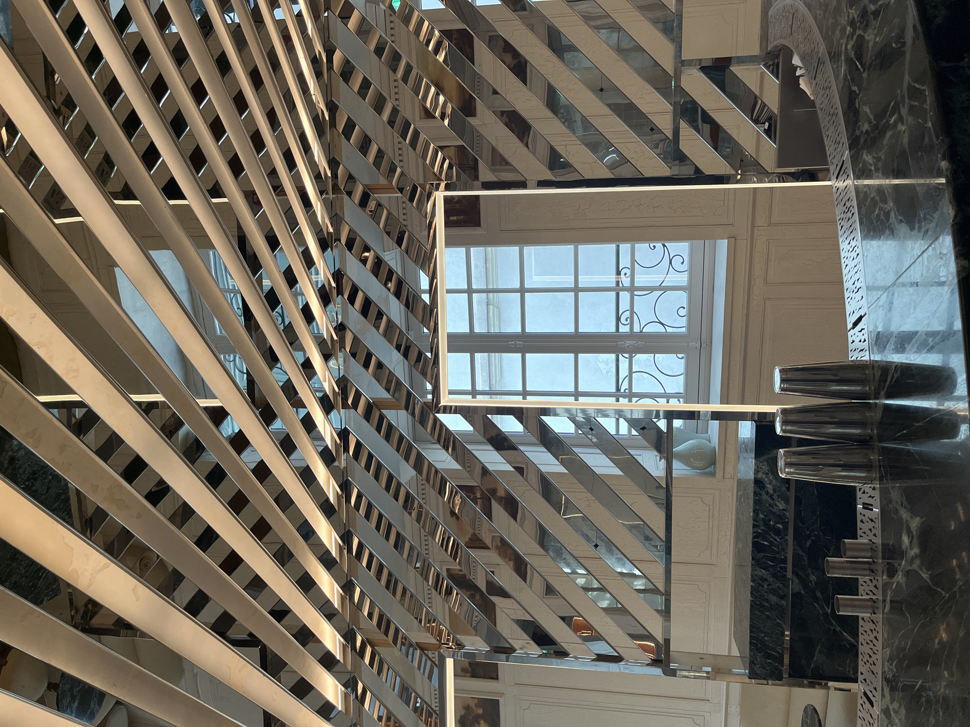 Light patterns documented in Parisian architectural interior