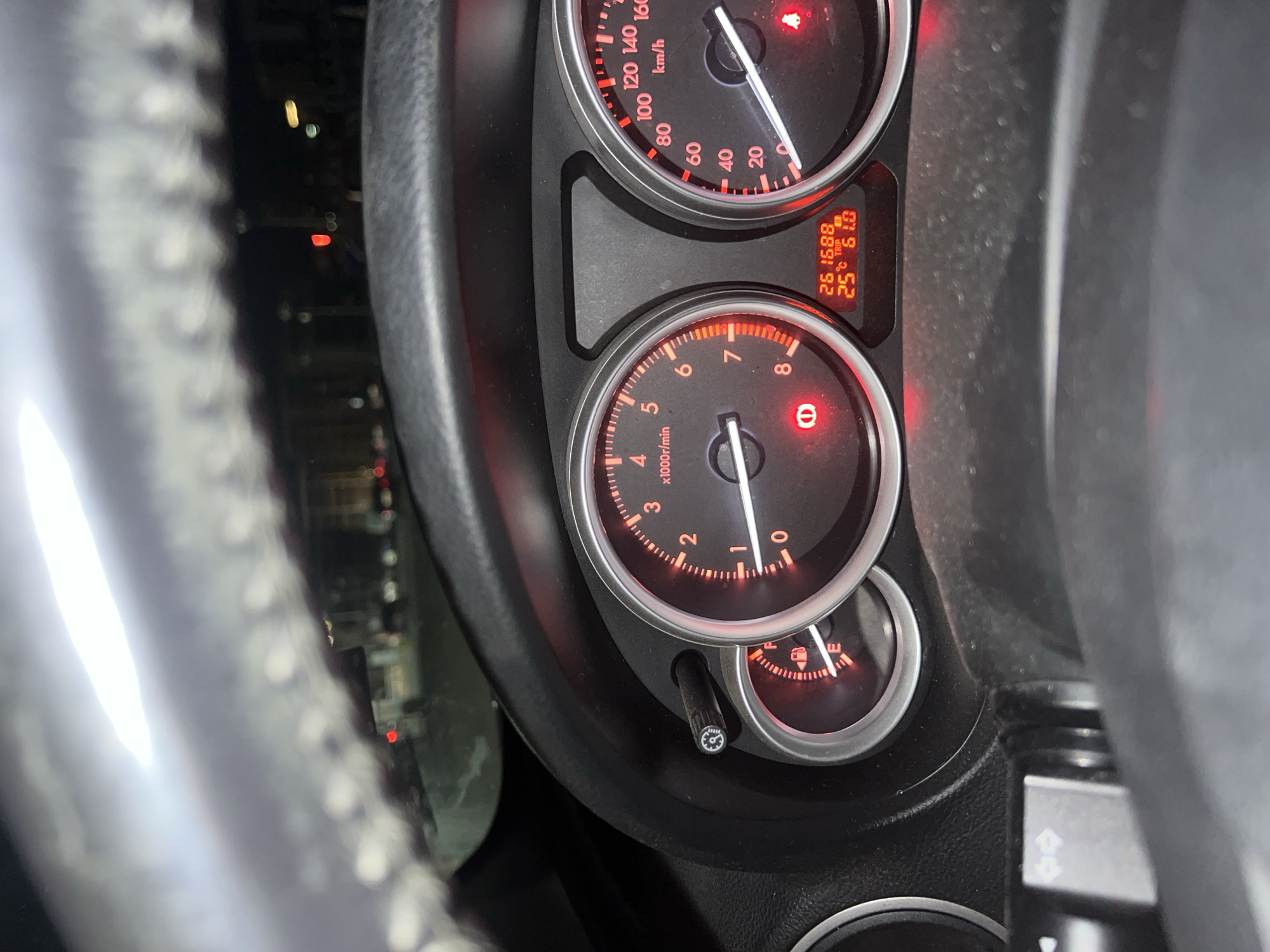 Driver monitors low fuel dashboard in Burgas Bulgaria