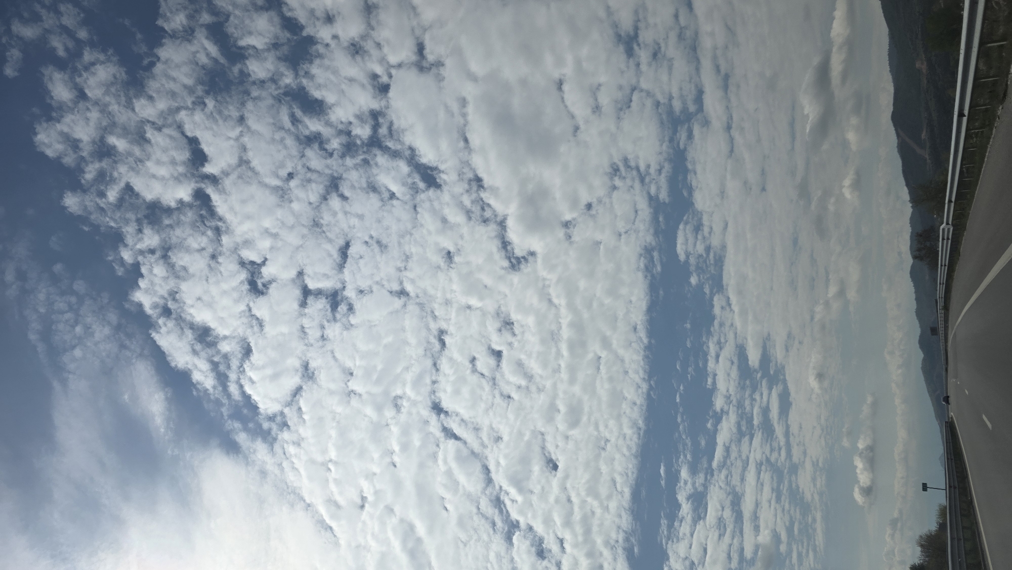 Rippled altocumulus clouds observed over Valkovo, Bulgaria highway