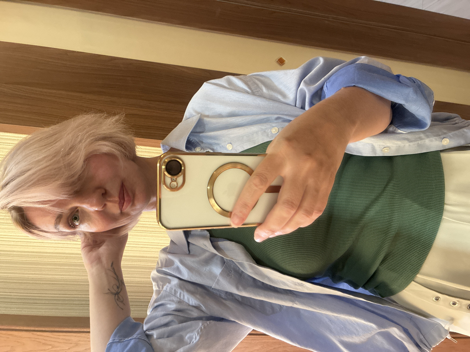 Woman takes mirror selfies in Sochi apartment