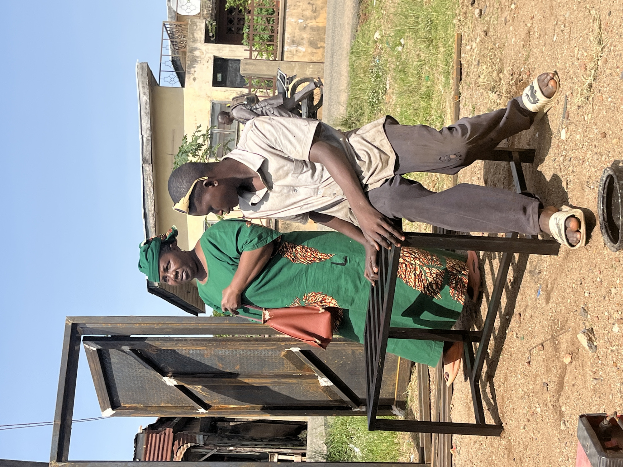 Morning street life and metalwork in Jos, Nigeria