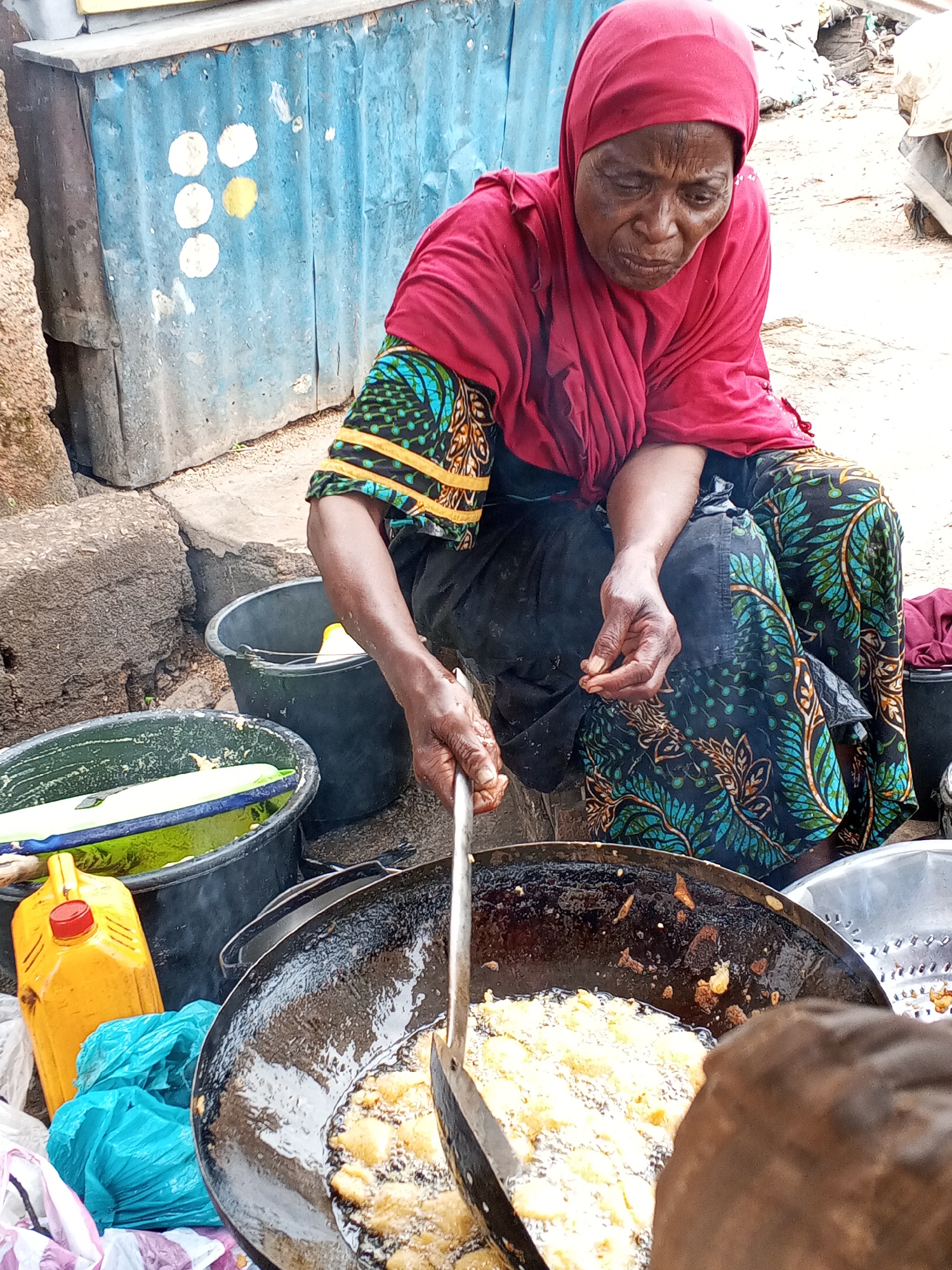 Street life and commerce on a Jos, Nigeria morning