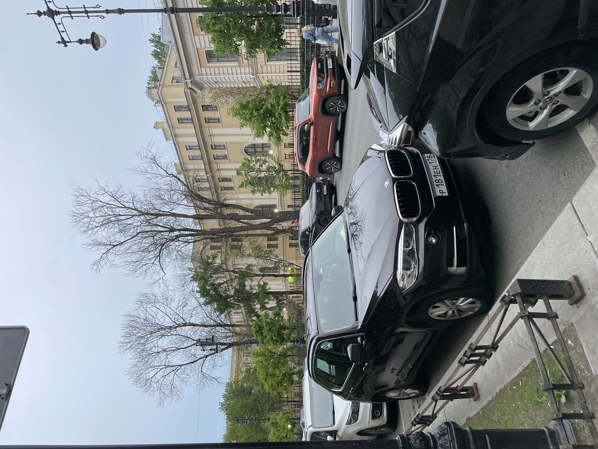 Cars parked on Saint Petersburg street during evening hours