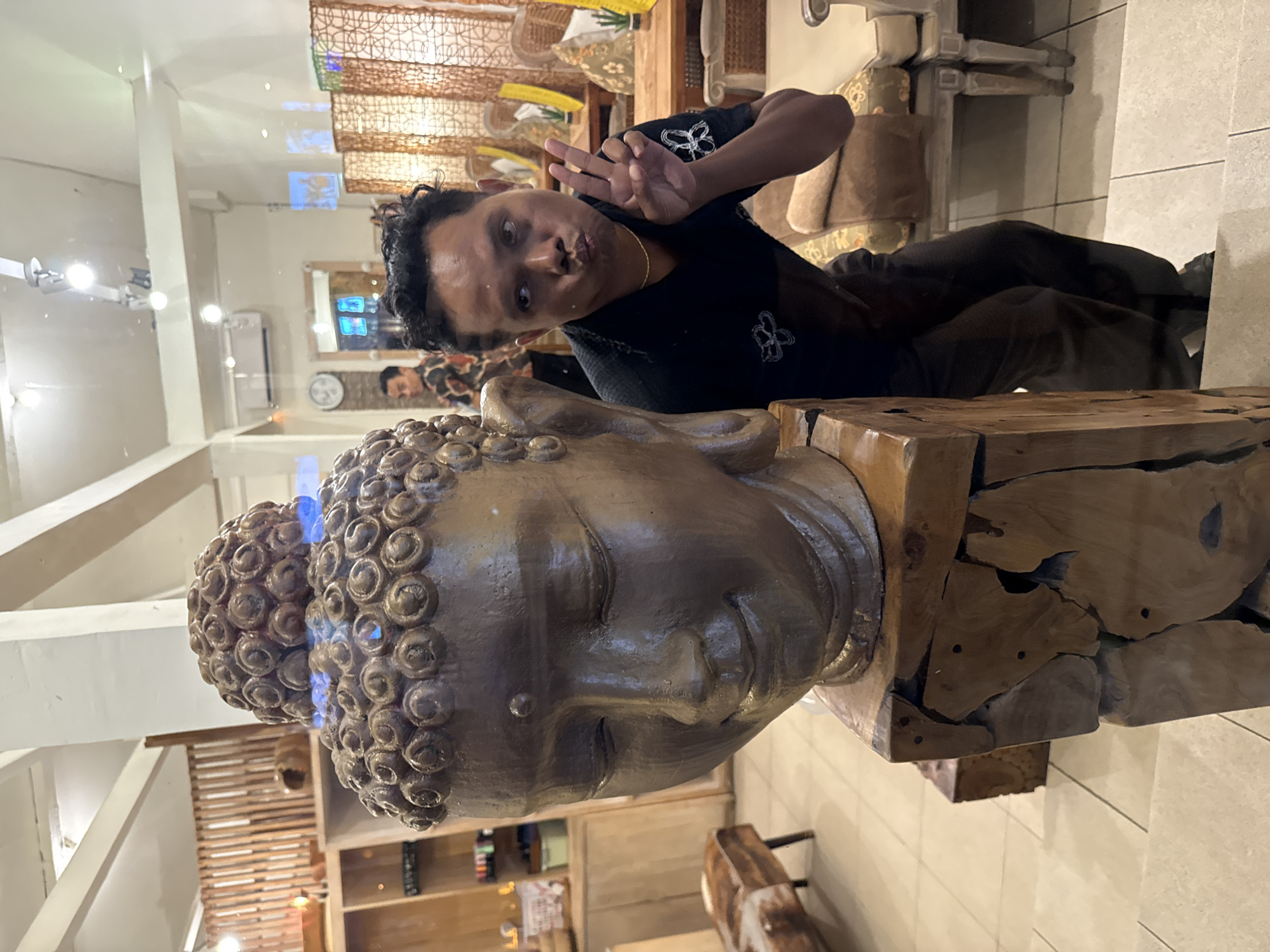Kuta's nightlife strip buzzing with bars, themed venues, and street scenes.