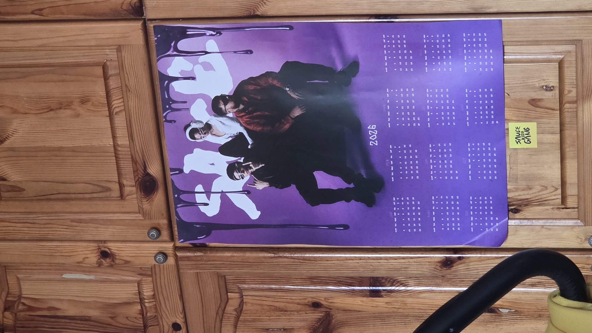 Wooden furniture display with VR headset and poster documented