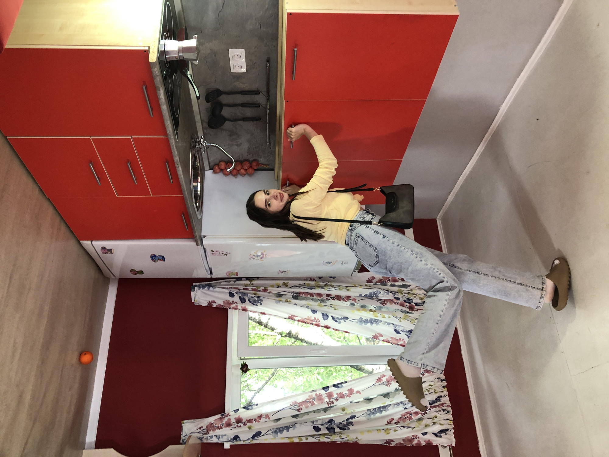 Exploring an upside-down house attraction in Izhevsk