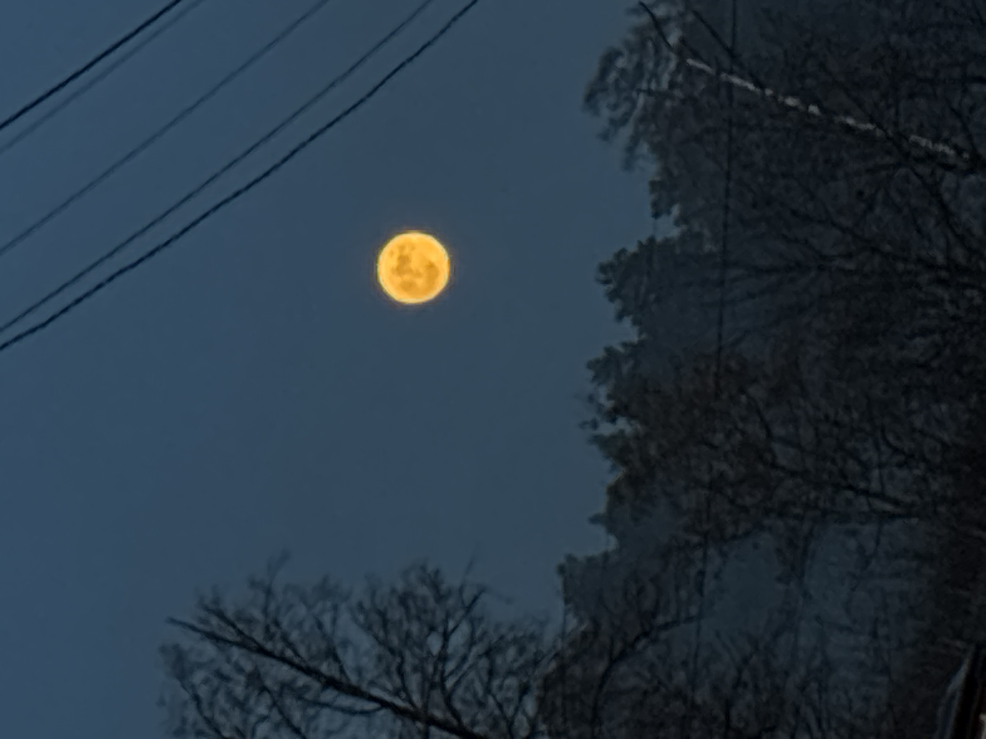 Full moon photographed over Chaikovsky, Russia evening sky