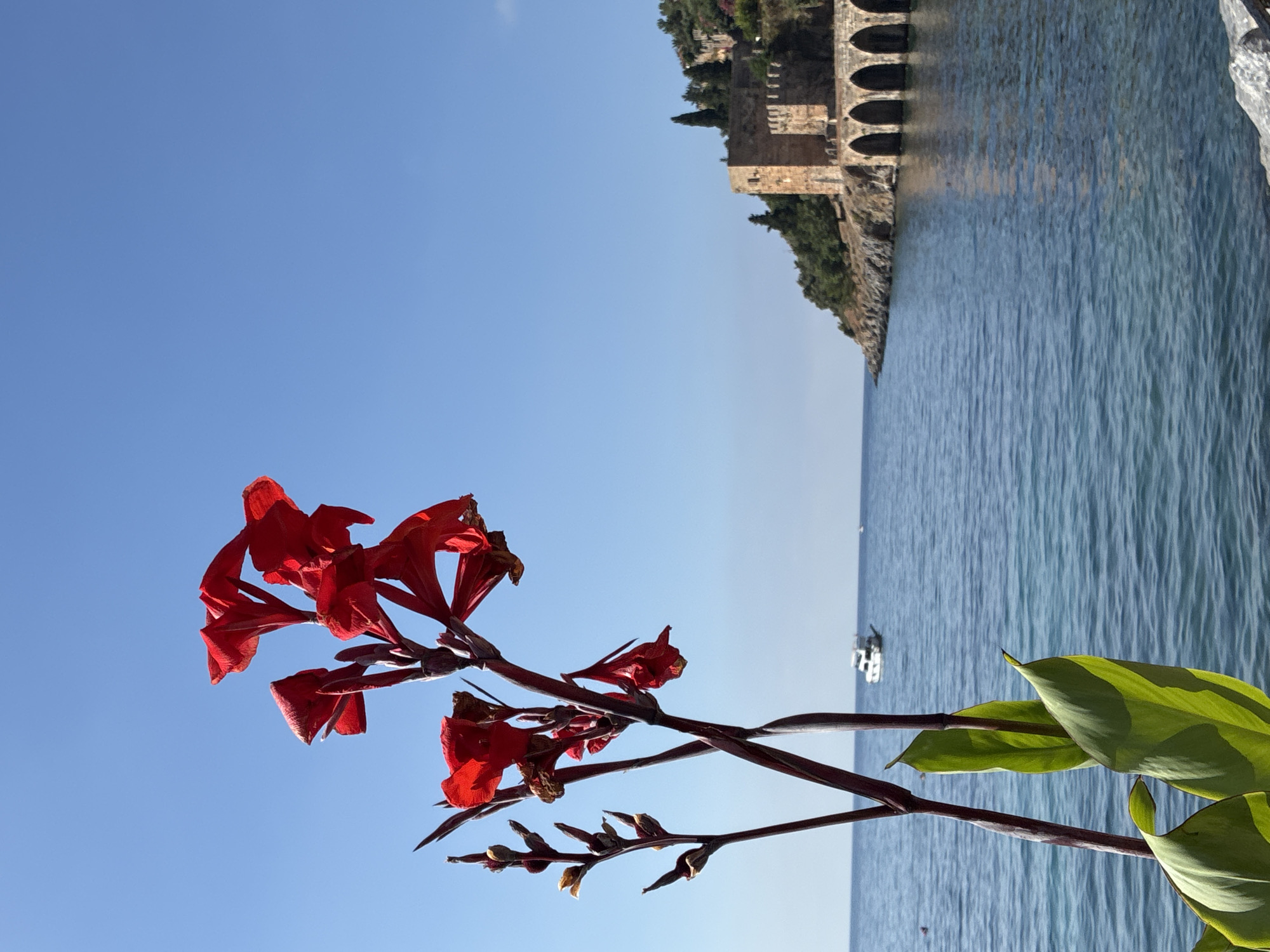 Alanya's Red Tower and Mediterranean coastline on a summer morning