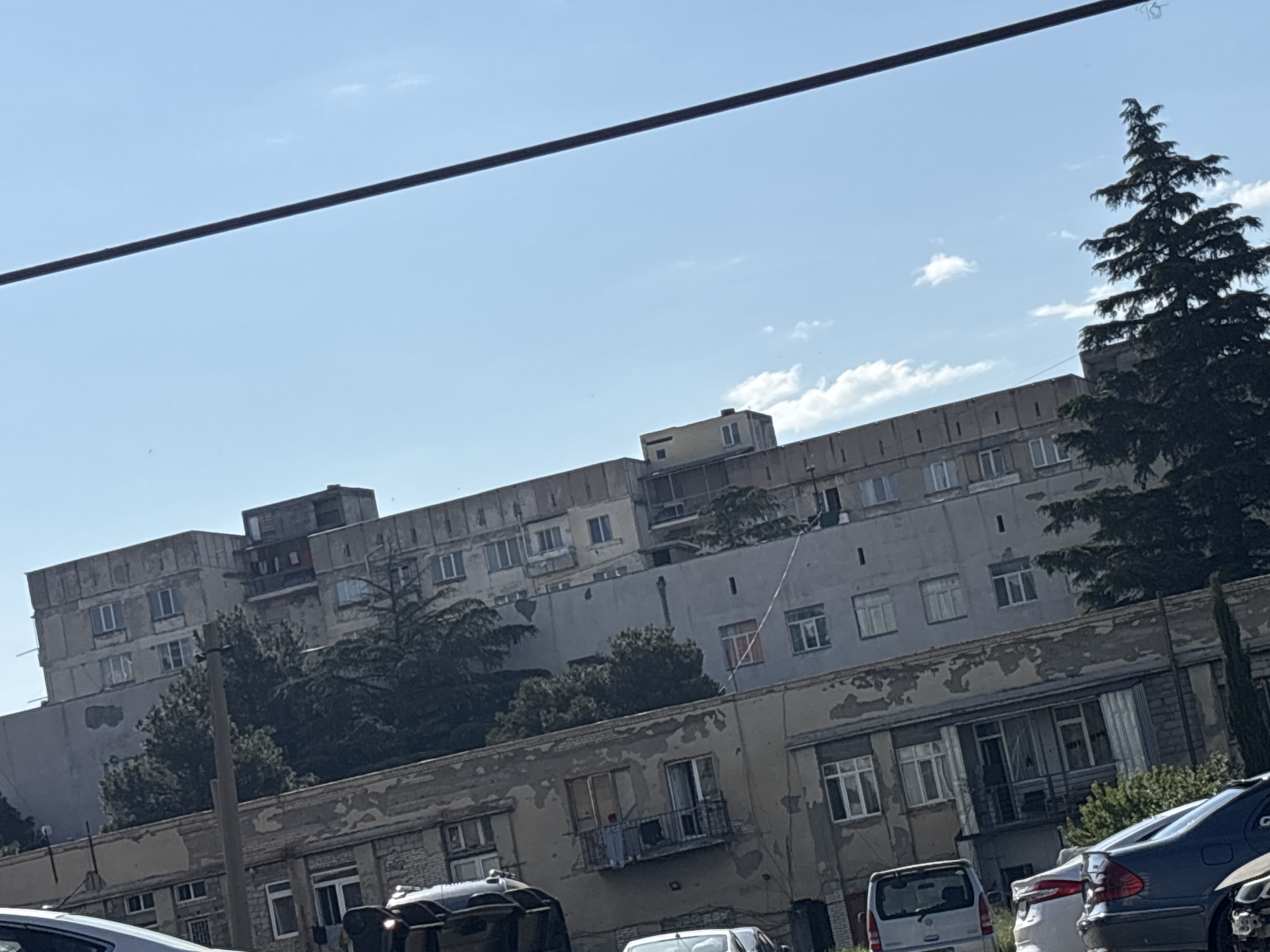 Morning street scenes and car selfies documented in Tbilisi