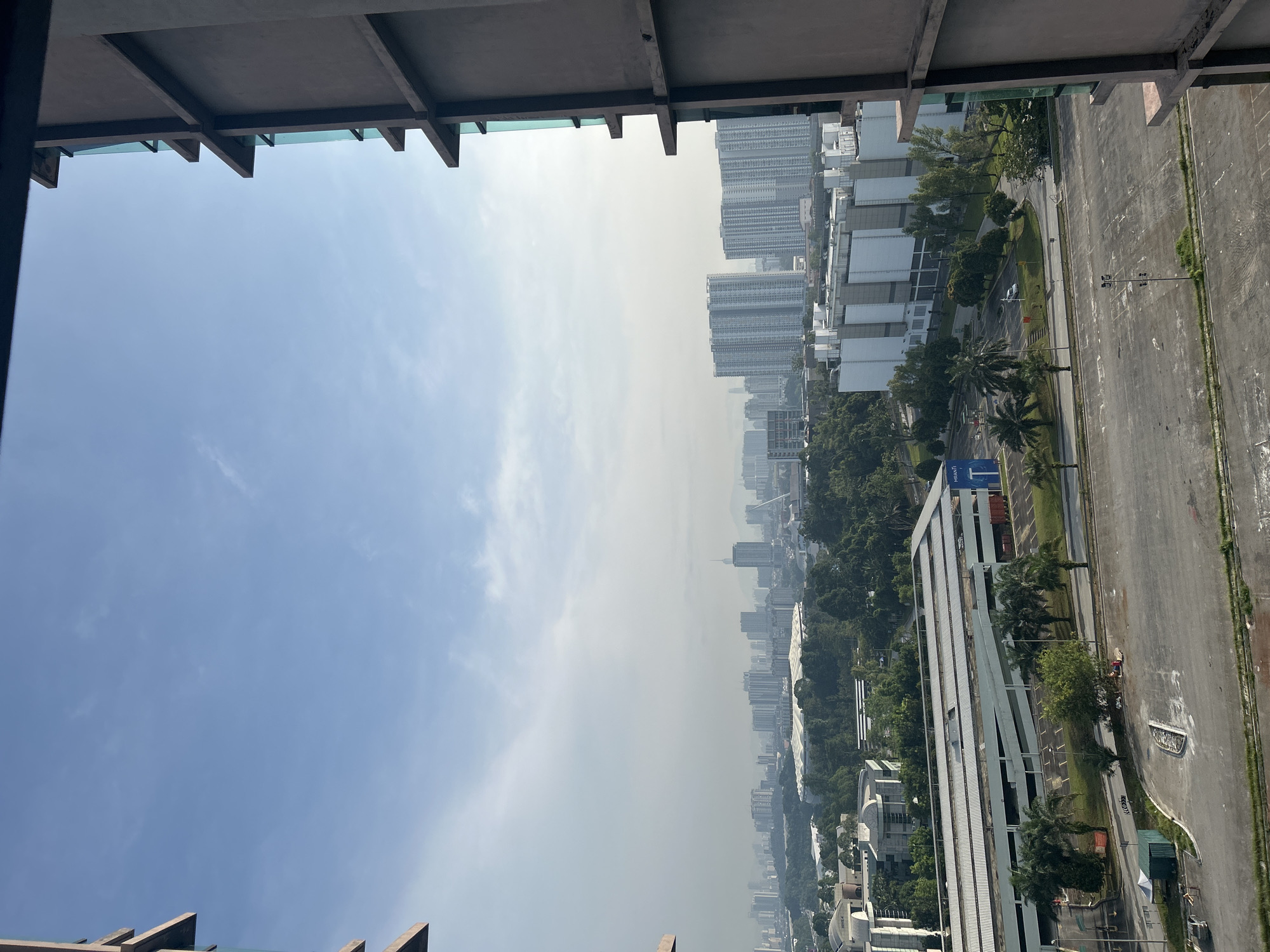Witness documents nighttime Kuala Lumpur cityscape from high-rise vantage point
