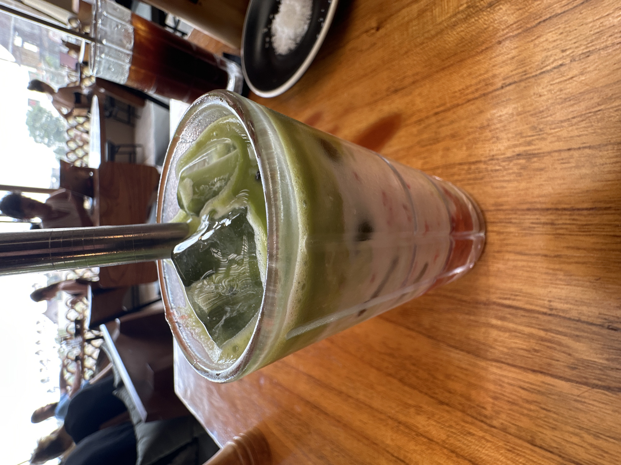 Iced matcha latte documented at Indonesian café