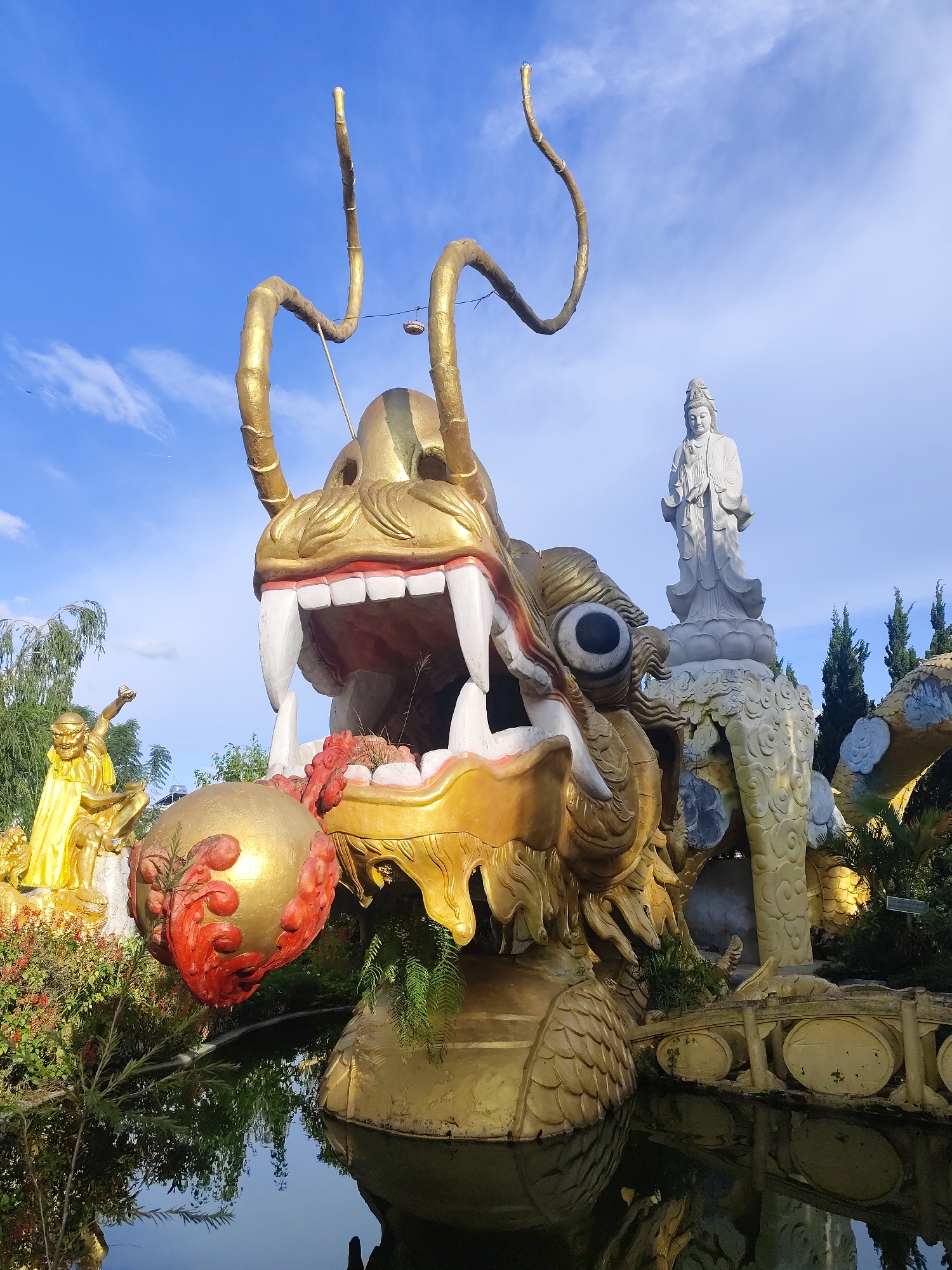 Da Lat temple complex packed with dragons, deities, and mythological statues