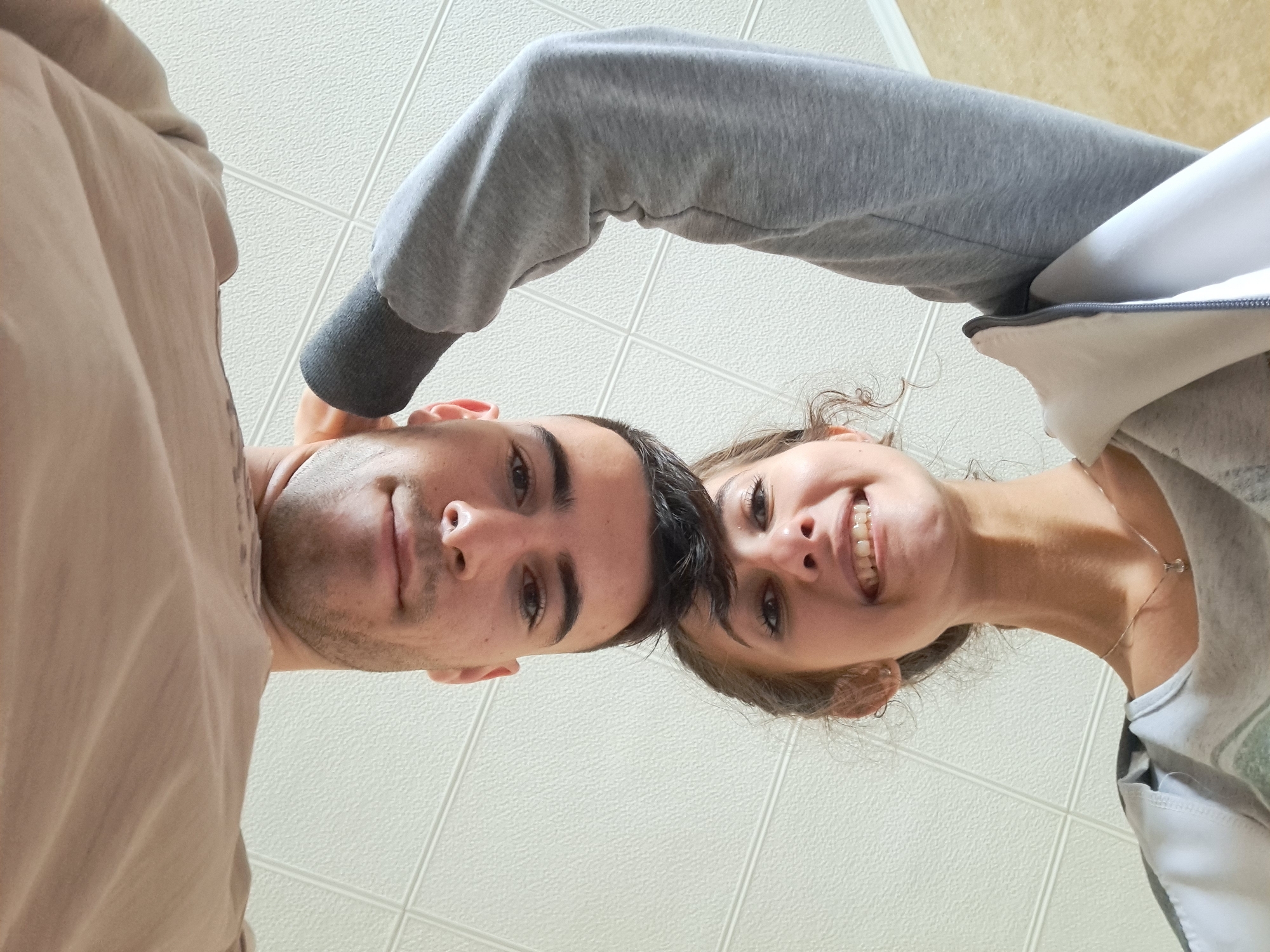 Couple takes mirror selfie in Bulgarian home