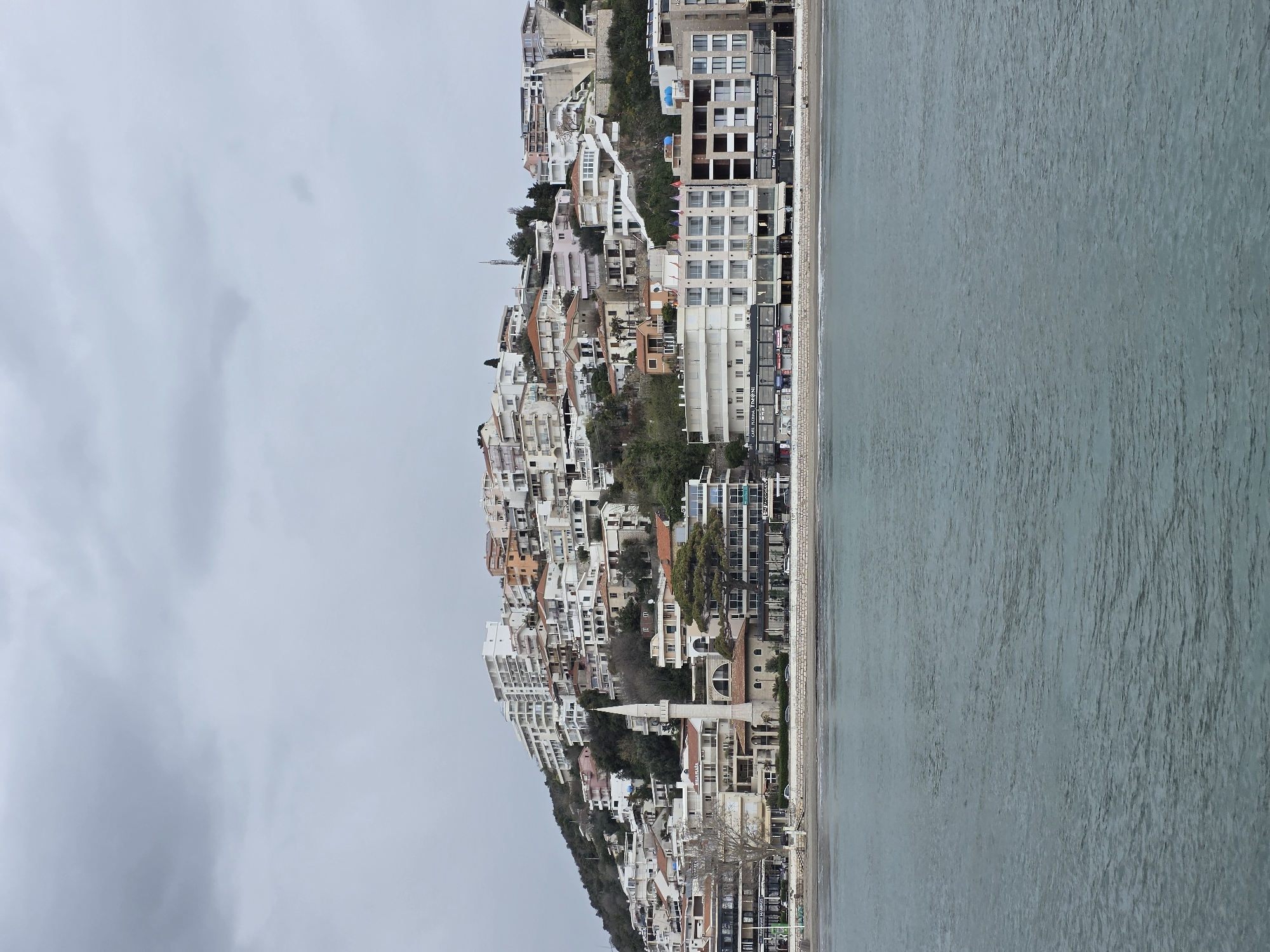 Tourist explores historic Ulcinj Old Town and coastal views